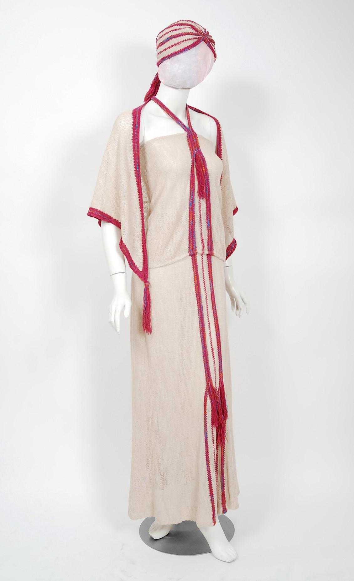 Gorgeous beige and raspberry hand-knit bohemian four-piece ensemble from the iconic London designer Mary Farrin. Examples of her work are included in the permanent collection at the British fashion V & A museum. This gorgeous garment is made of a
