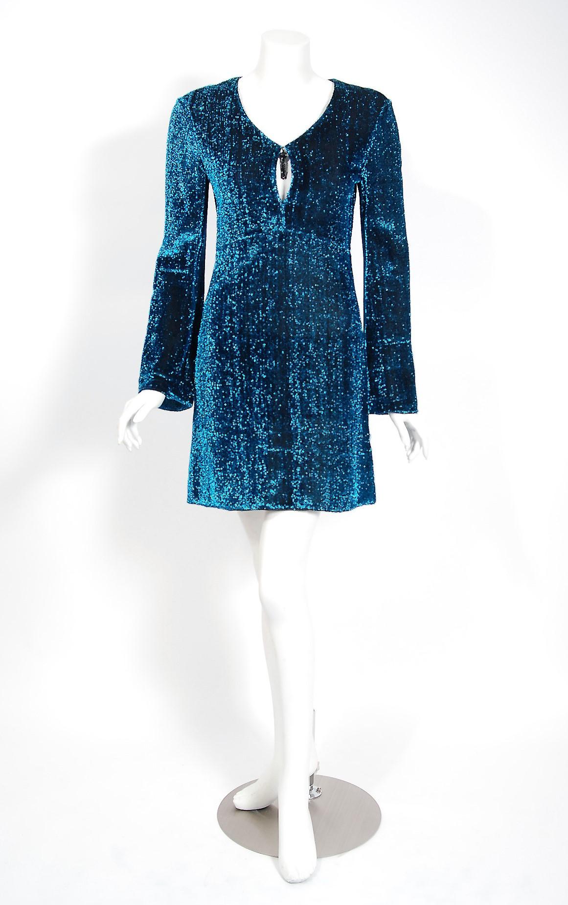 Sensational Michael Mott for Paraphernalia metallic teal-blue lurex knit dress dating back to the late 1960's. Michael Mott was one of the few young designers hired by this chic New York boutique, starting in 1965. Taking his cues from the more