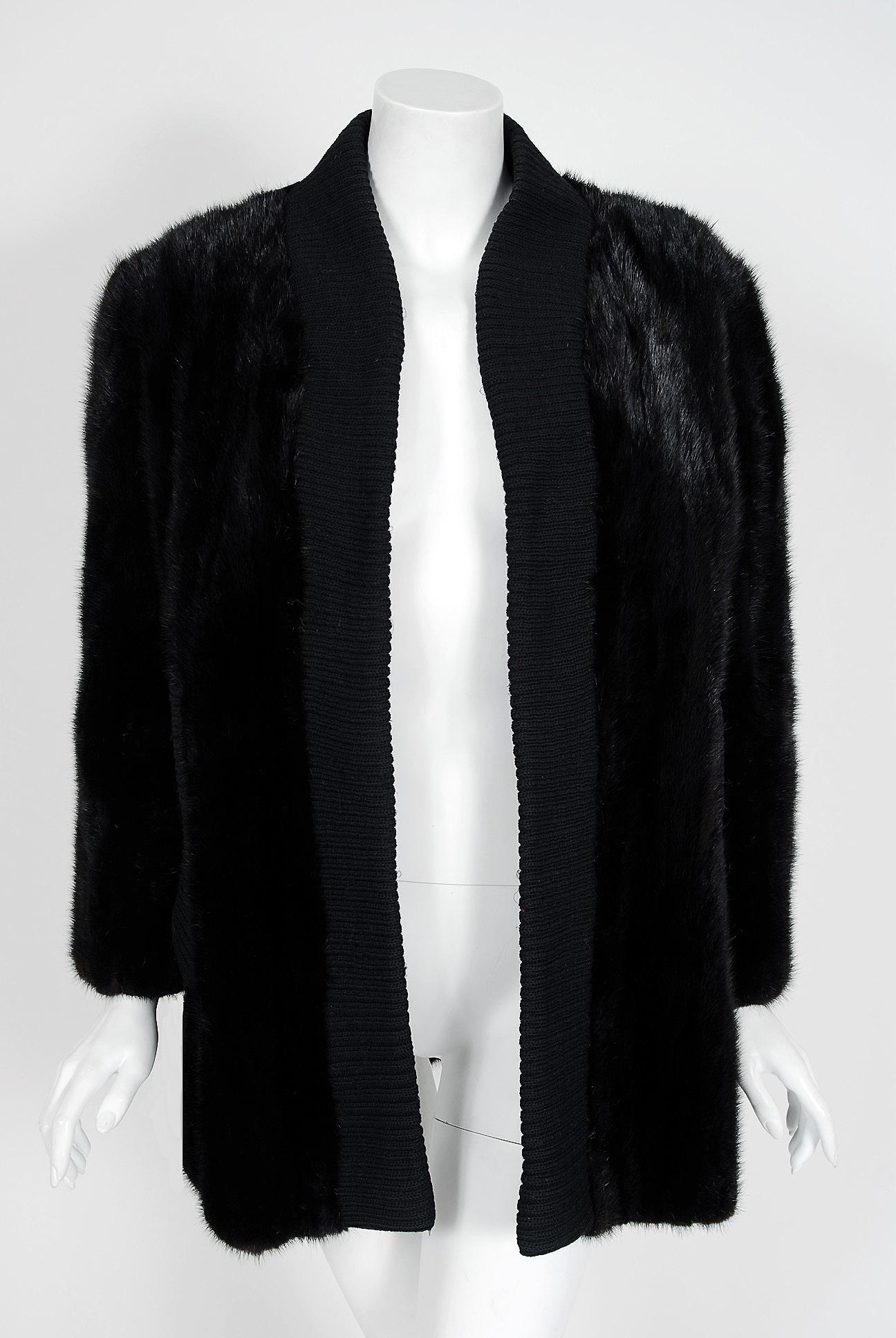 This exquisite 1968 Pierre Cardin Couture genuine mink-fur and wool knit cardigan will make any woman shine during the upcoming colder months. The soft dark mink been worked into vertical panels and the effect is really breathtaking. The care to