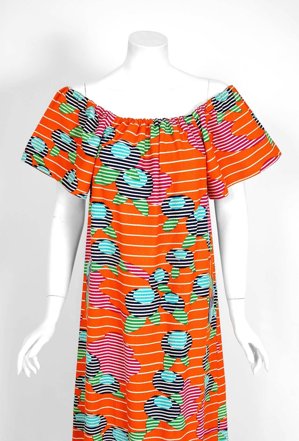 This extremely chic Lanvin treasure, in the most stunning op-art graphic textured cotton, is a statement dress. I love the rainbow of colors and modern peasant vibe. It manifests liveliness and makes you feel confident. Shaped with princess-line