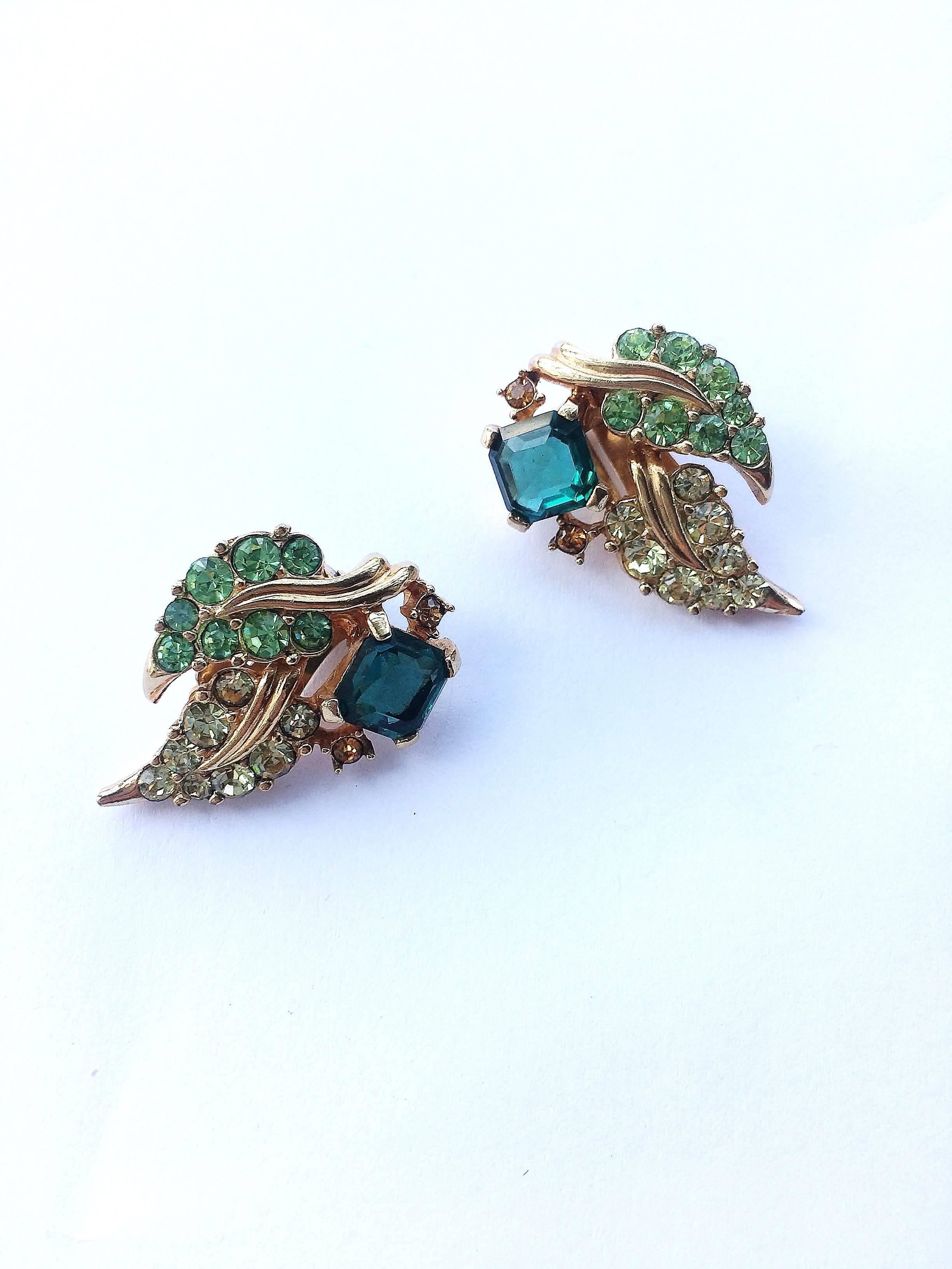 Exquisite multi coloured and multi shaped paste earrings by Marcel Boucher, in peridot, and citrine smaller paste with square cut 'emerald' pastes - reminiscent of Cartier or Van Cleef and Arpels jewellery. Fresh and light colours giving a very
