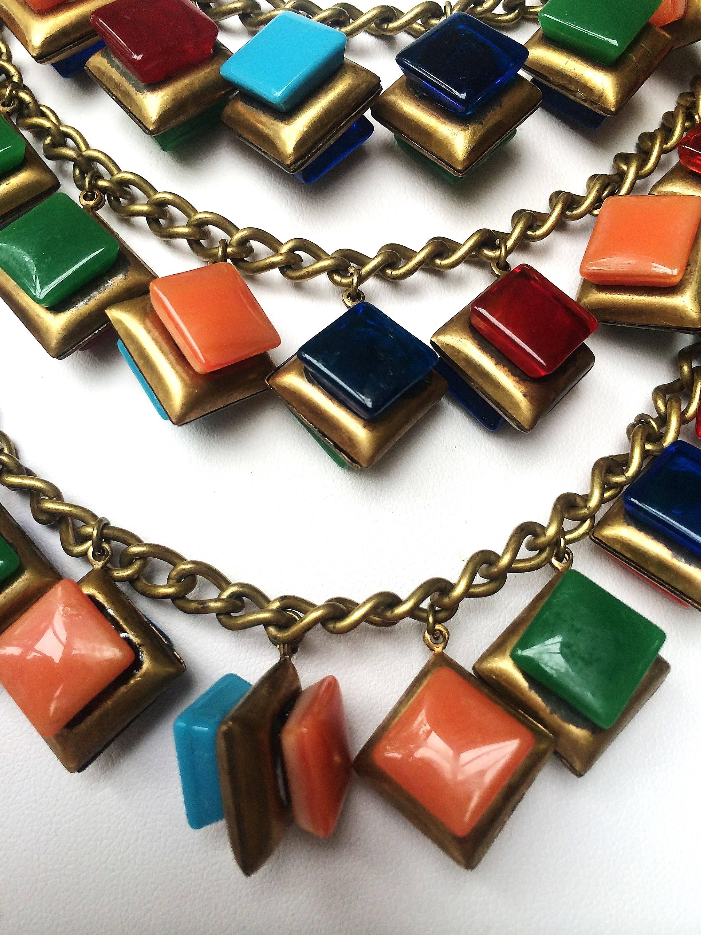 A striking three row glass square 'charm' necklace, 1930s. For Sale 1