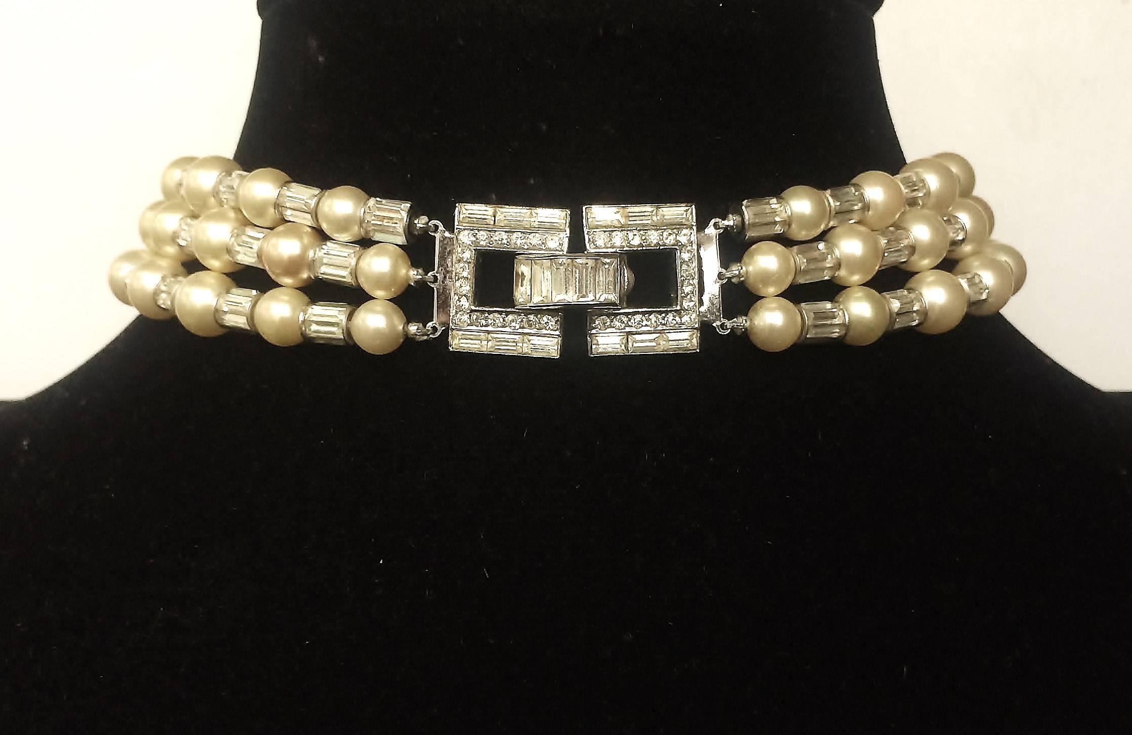 This highly elegant necklace/choker, made of glass pearls and clear paste baguette rondelles, was originally designed by Alfred Philippe of Trifari for First Lady Mamie Eisenhower, who wore it to her inaugural ball in 1953. She broke with tradition