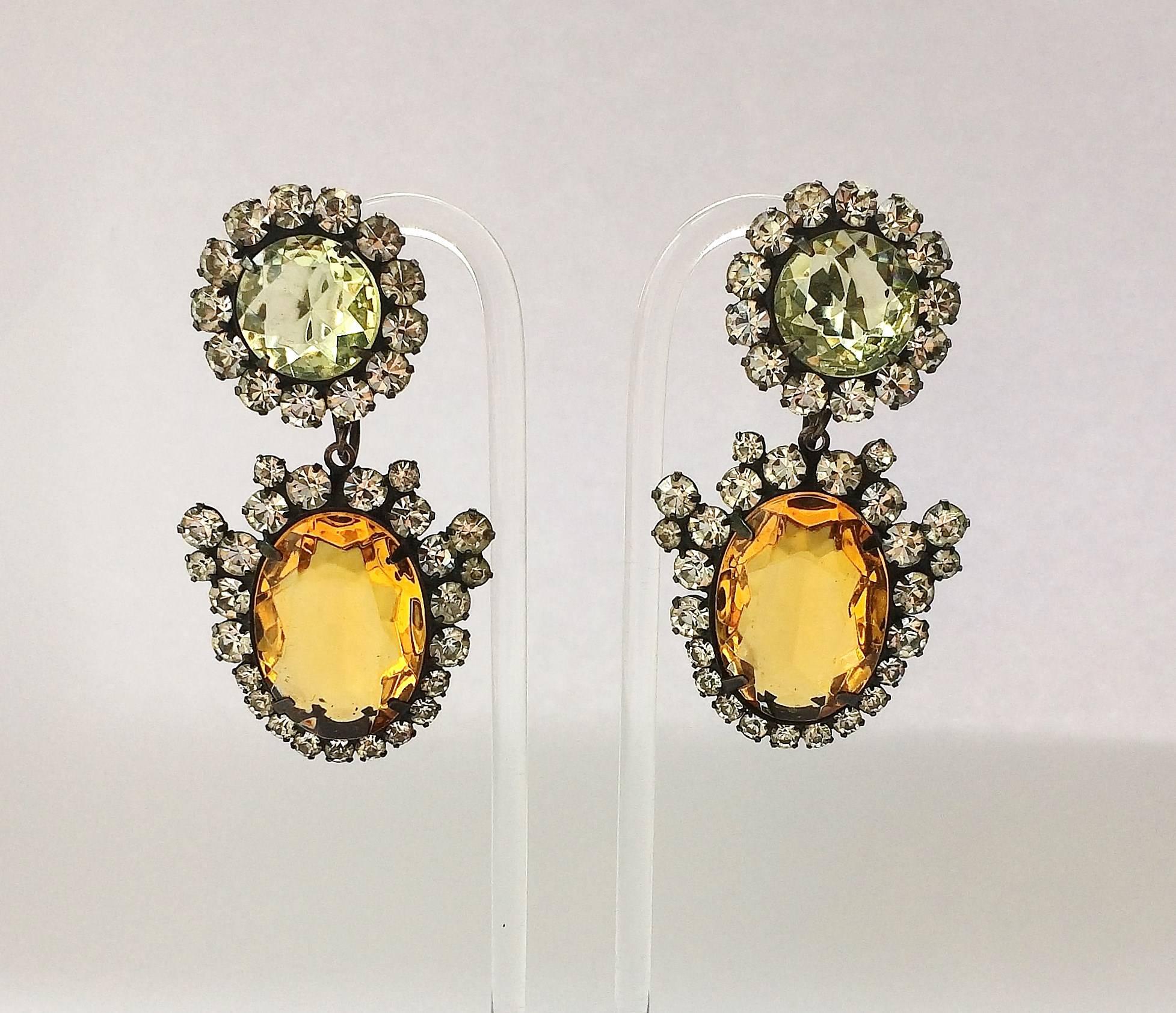 Elegant drop earrings by Kenneth Jay Lane, in subtle colours of citrine and topaz, surrounded by clear paste. Again, as with many of KJL design's from the this period, they have a highly glamorous, more antique look, and are very wearable for many