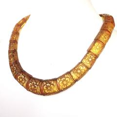 Graduated carved bakelite necklace, and matching bracelet, 1920s