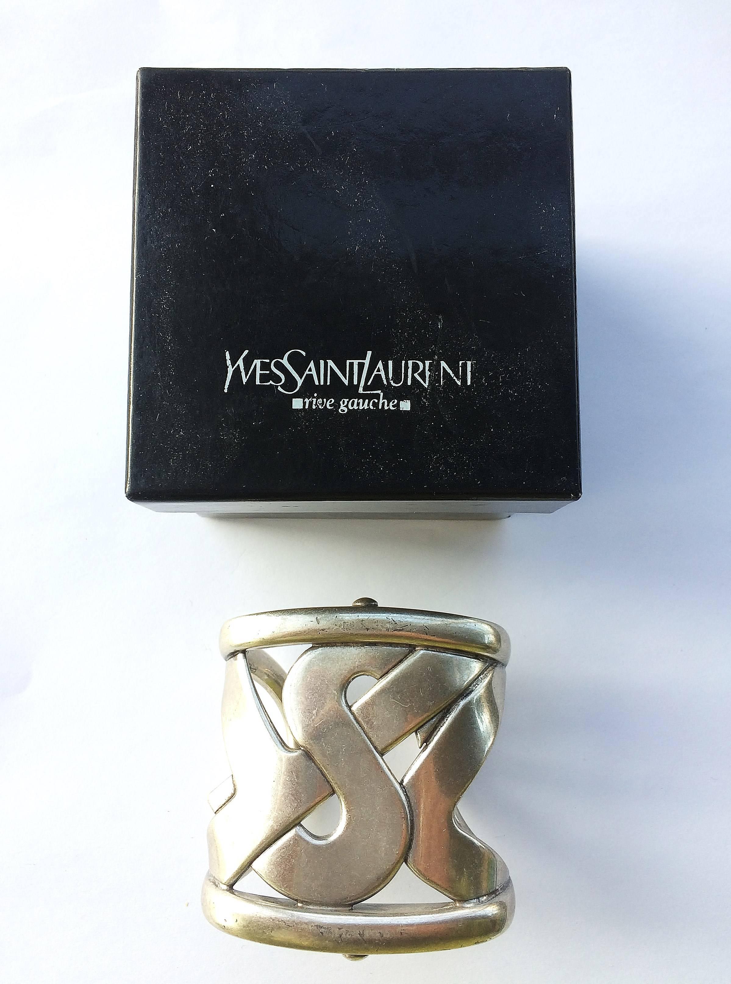 A statement logo silver plated cuff bangle, Yves Saint Laurent, France,  1980s. 1