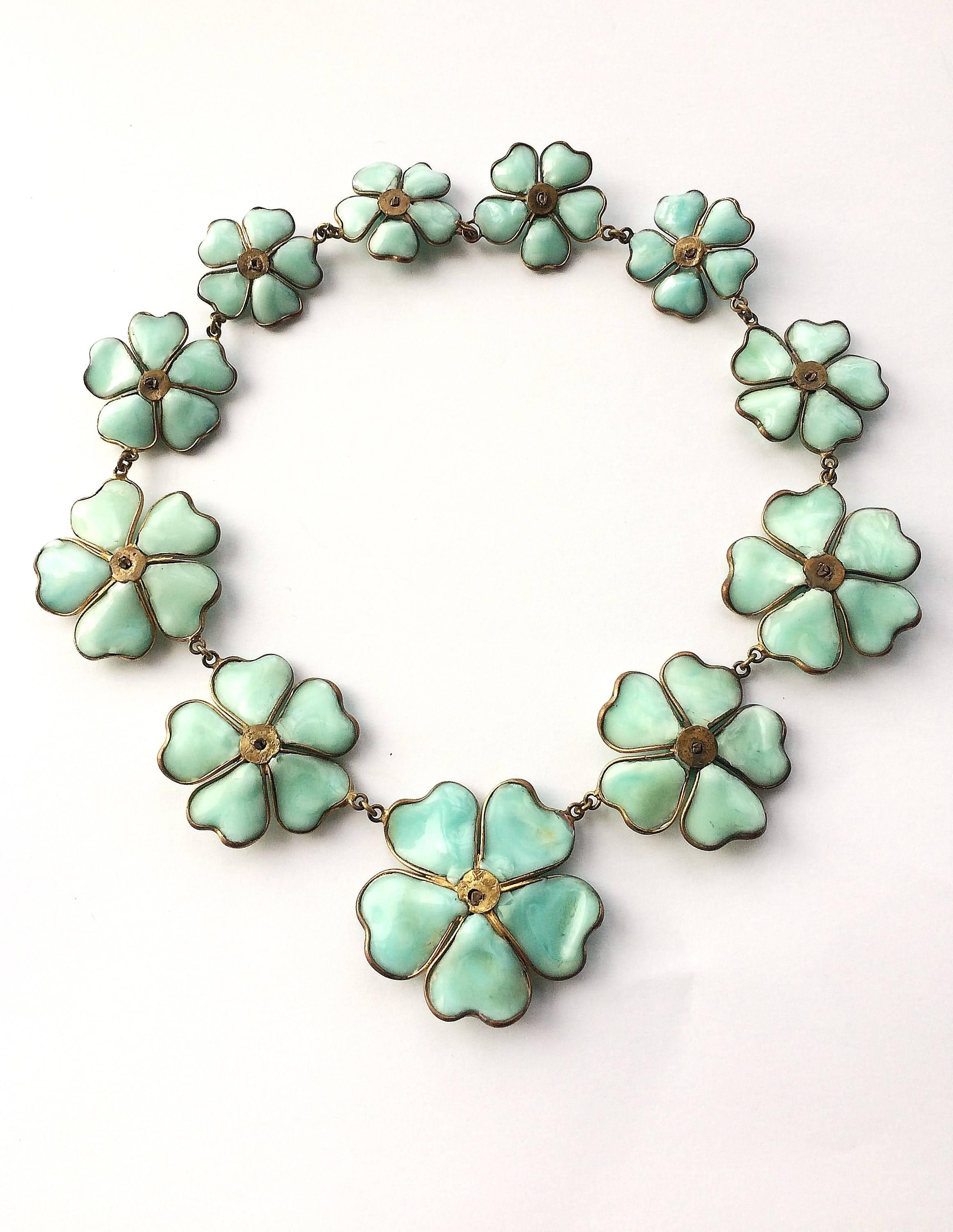 Perhaps the most well known and iconic Chanel necklace, this is handmade in the 1930s from gilt metal and poured glass by Maison Gripoix. The metalwork and glass are of a much finer workmanship than is seen today. This necklace came in a variety of