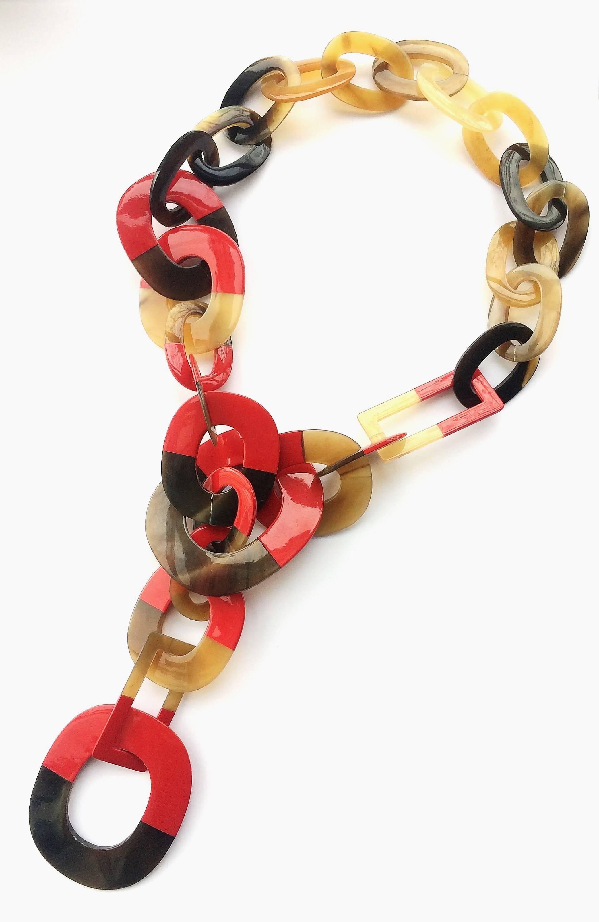 Highly wearable and versatile unsigned sautoir necklace by Hermes from recent years, made from high quality horn that has been lacquered, in this instance, in red.Most links are fully 'sealed', others have a 'join' in the link.
Lustrous and