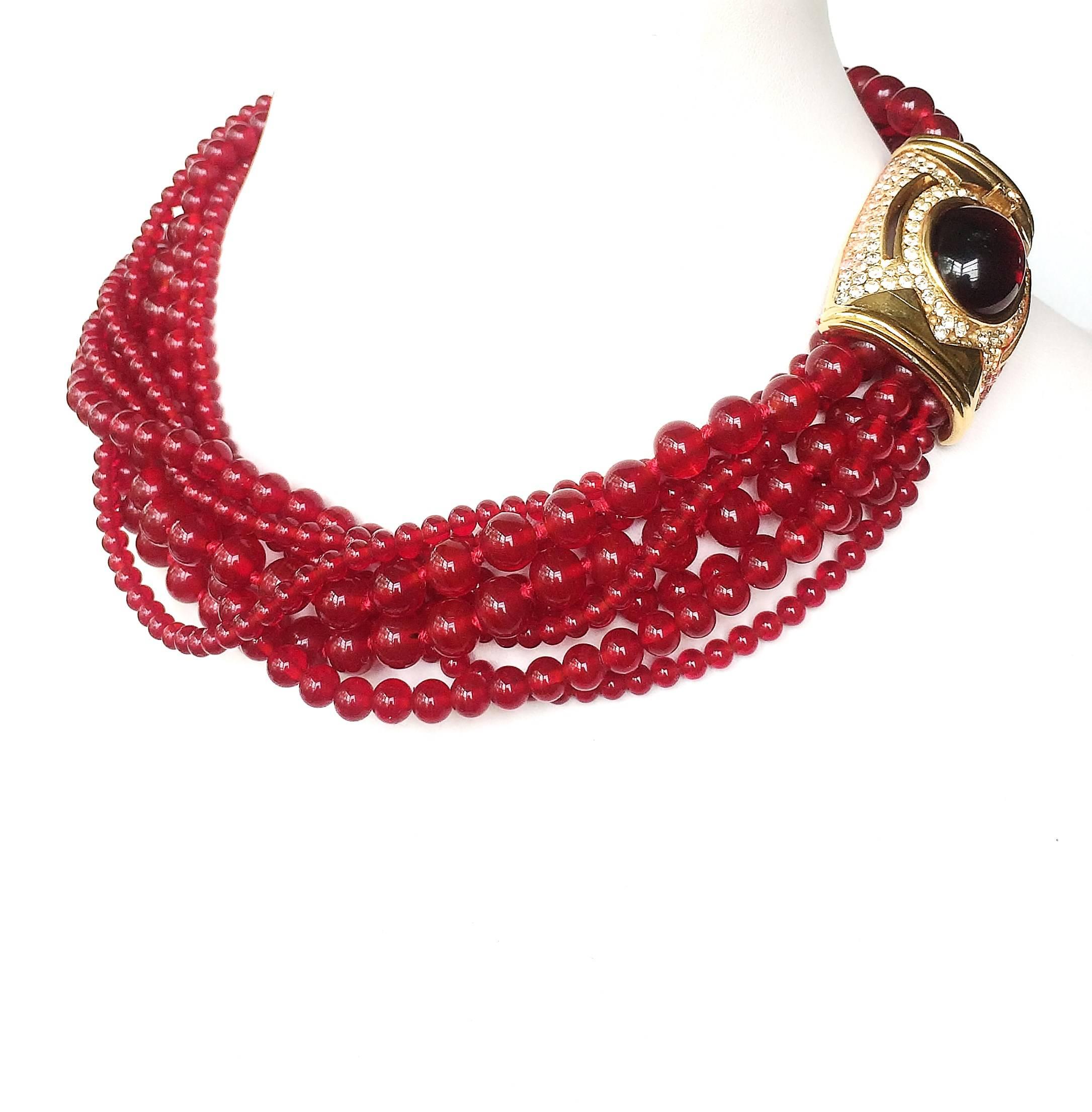 Really beautiful hand knotted rich red glass beads from super high quality brand Ciner. The gilt centre piece is also the clasp. The look can be maxed up with the matching earrings or the pieces can be worn separately. 