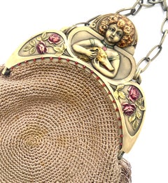 A celluloid frame and crocheted silk fringed handbag, with flapper motif, France