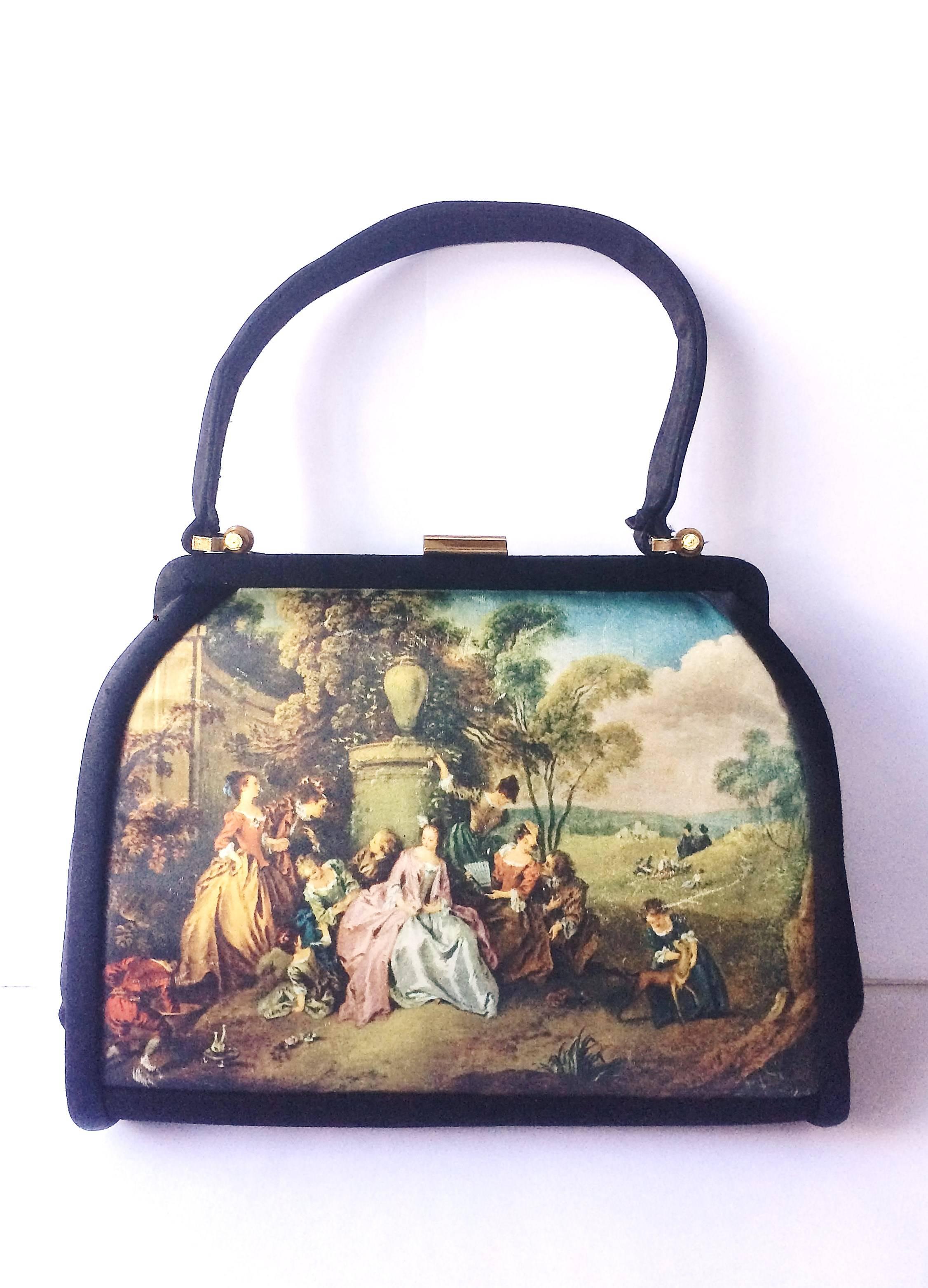 A highly unusual and elegant handbag, using a Watteau/Watteau style painting , with a compact, wallet/change purse and larger make up purse, all with 18th century French Romantic painting images ( Boucher, Watteau), made from black and printed silk,