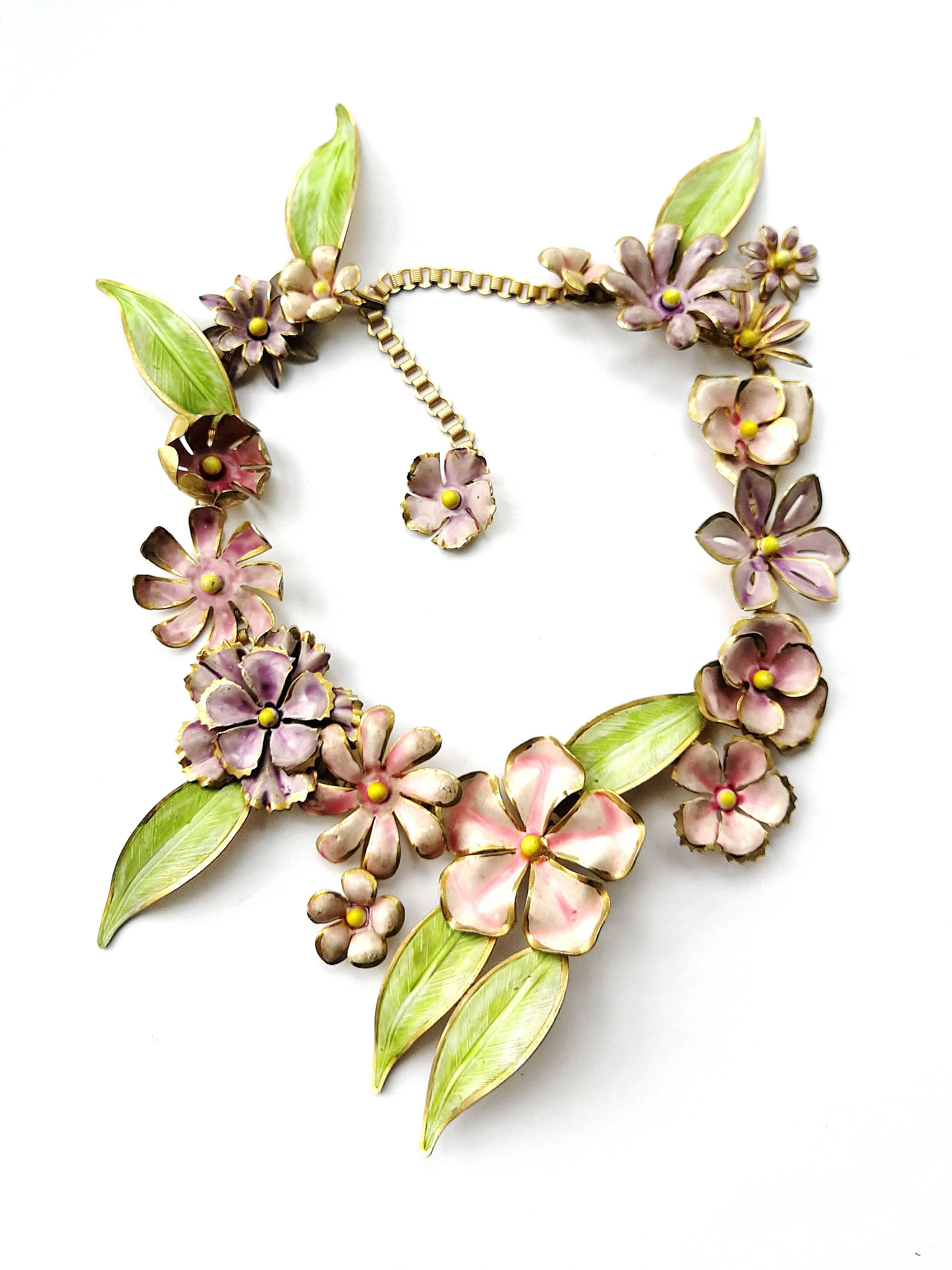 A dynamic and striking necklace by Sandor in soft pastel colours  of flowers falling and tumbling all round the necklace, their leaves highlighting this overall effect.
A very famous piece by Sandor from the 1960s, it is fully articulated, hence,