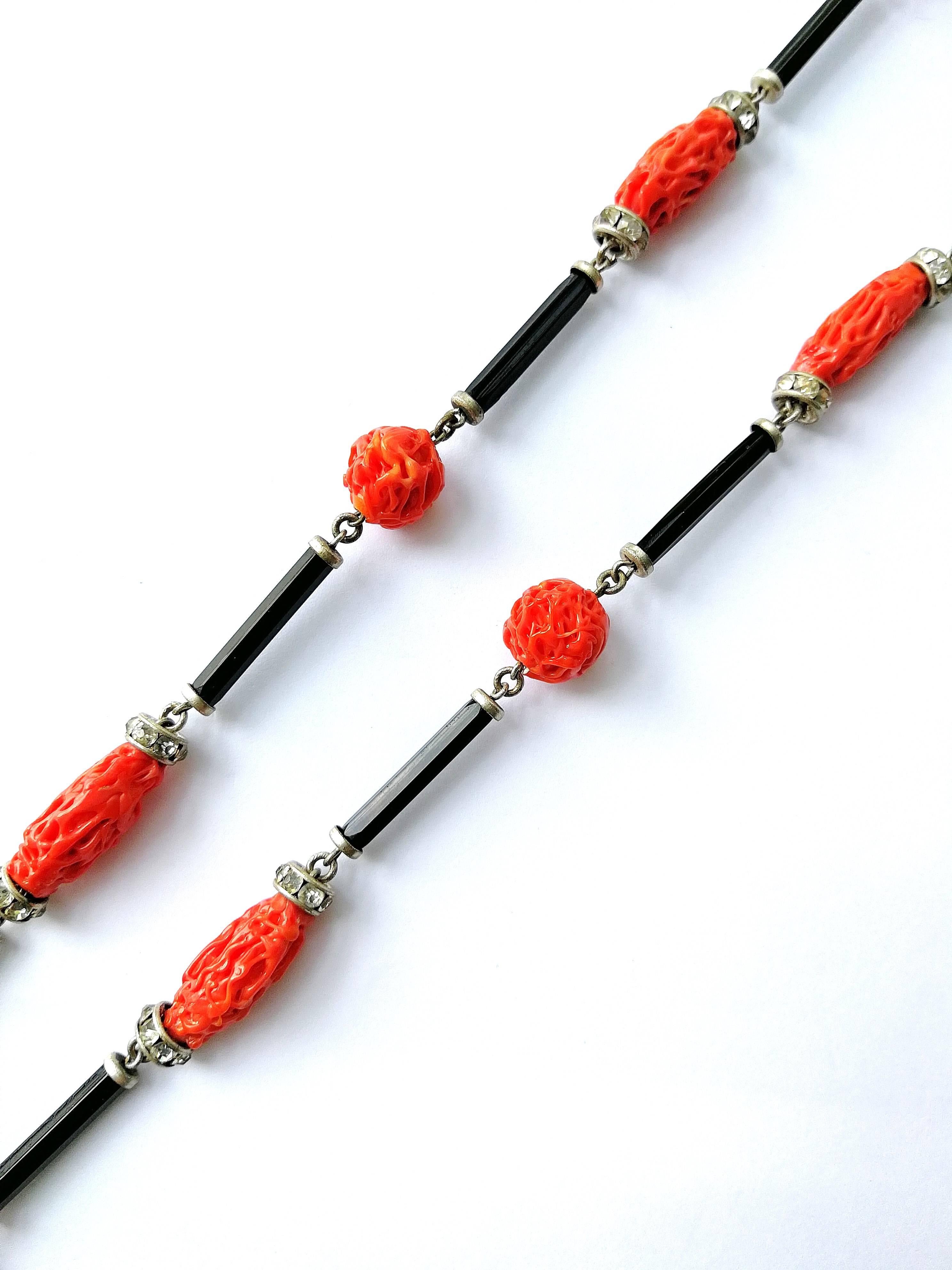 Black and coral 'lampwork' glass and paste rondelle sautoir, France, 1920s 1