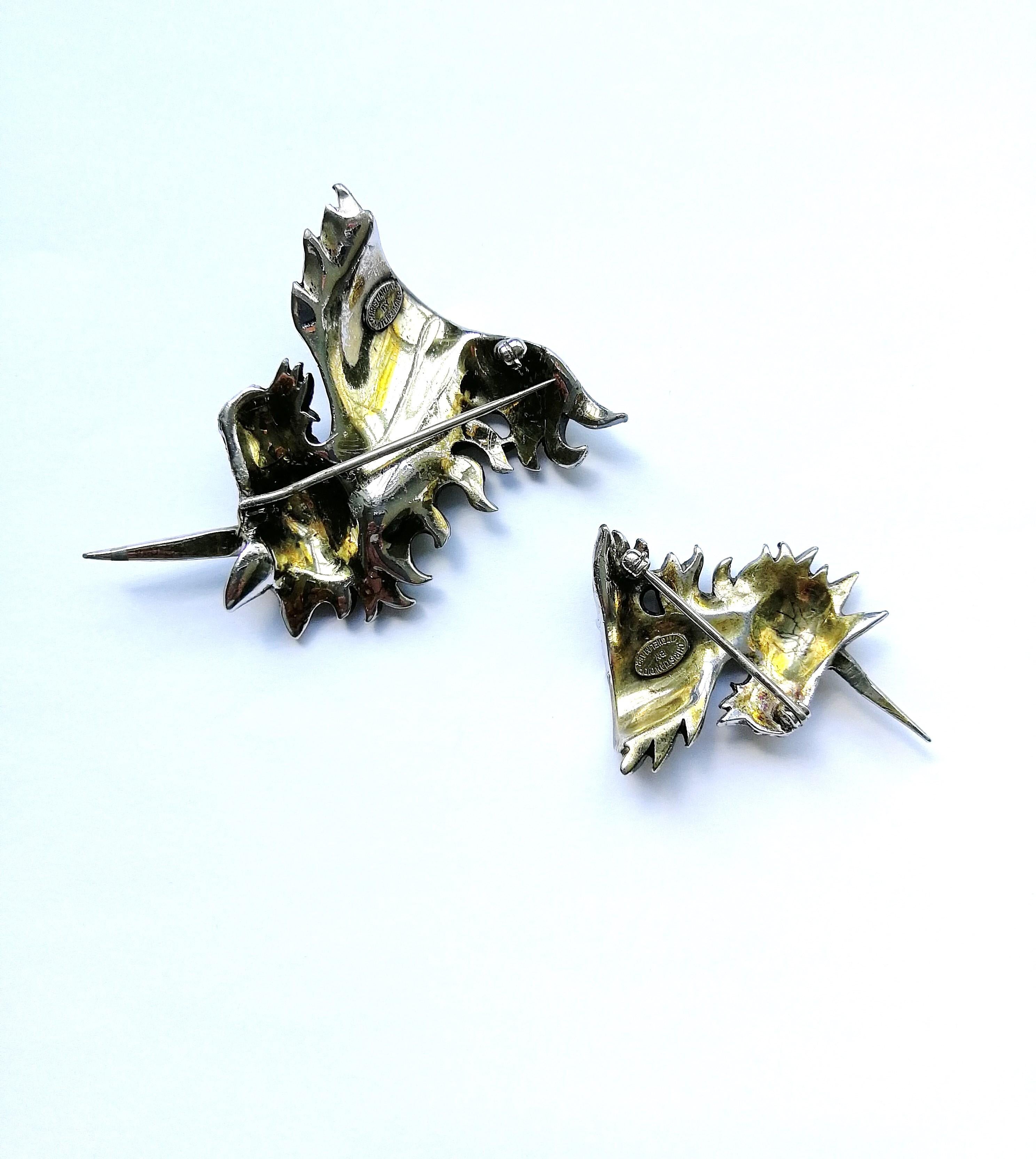 A pair of paste and gilt metal 'unicorn' brooches, Christian Dior, c1954. 5