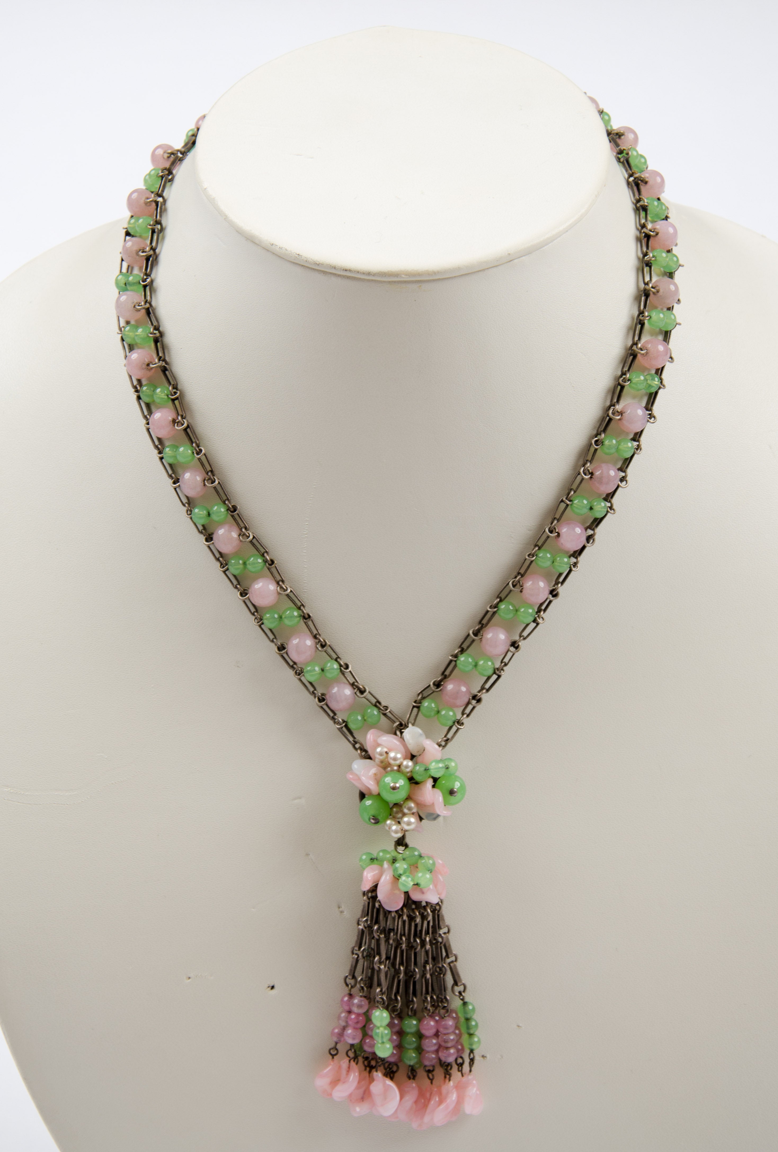 This necklace is a wonderfully colored, delicate example of the work of Louis Rousselet [Paris 1892-1980) - he was the head of one of the most important
pearl manufacturing workshops during the 20th century. He was apprenticed as a glass bead
