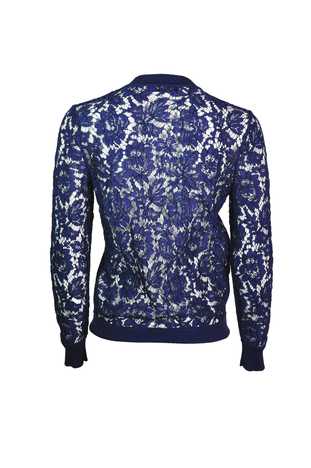 A simple and elegant Valentino cotton lace cardigan in navy.  It features with ribbed cotton trims.  Button fastenings through front. Size is small