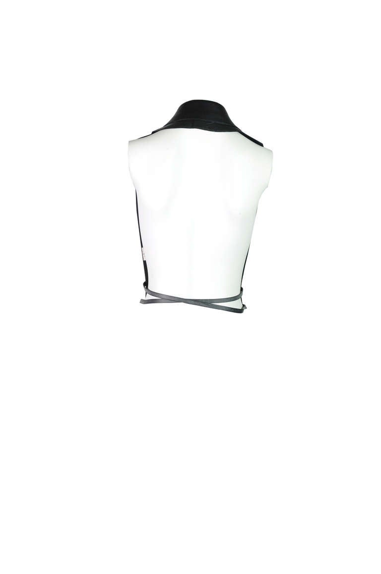 A very stylish wrapped around leather vest from Hermes by Jean Paul Gaultier.