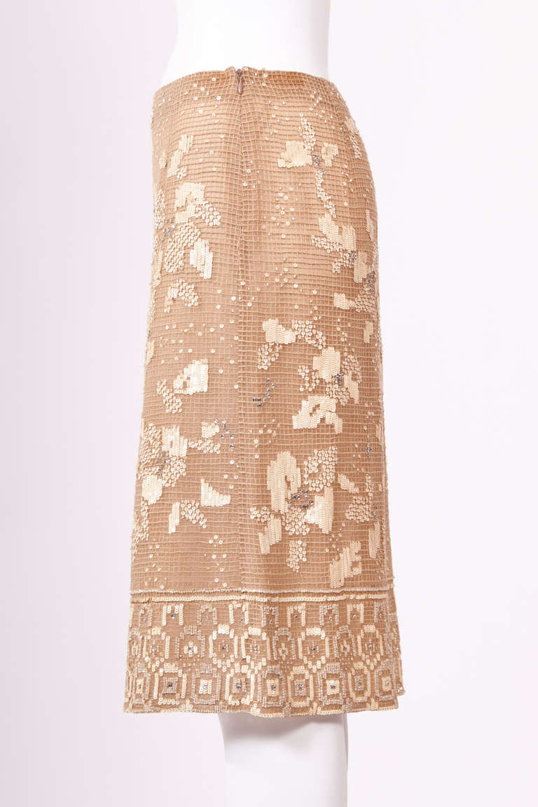 A very exquisite and beautifully crafted  skirt with sequins and crystals from Valentino  90'S collection, it falls above the knee.  Zip fastening at side.