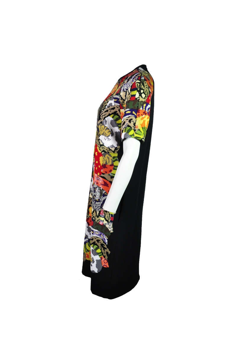 A sold-out Fendi lightly stretch jersey crepe dress features with colorful sequin jungle motif at front.  Jewel neck and short sleeves. Concealed hook and zip fastening at back. Fully lined.