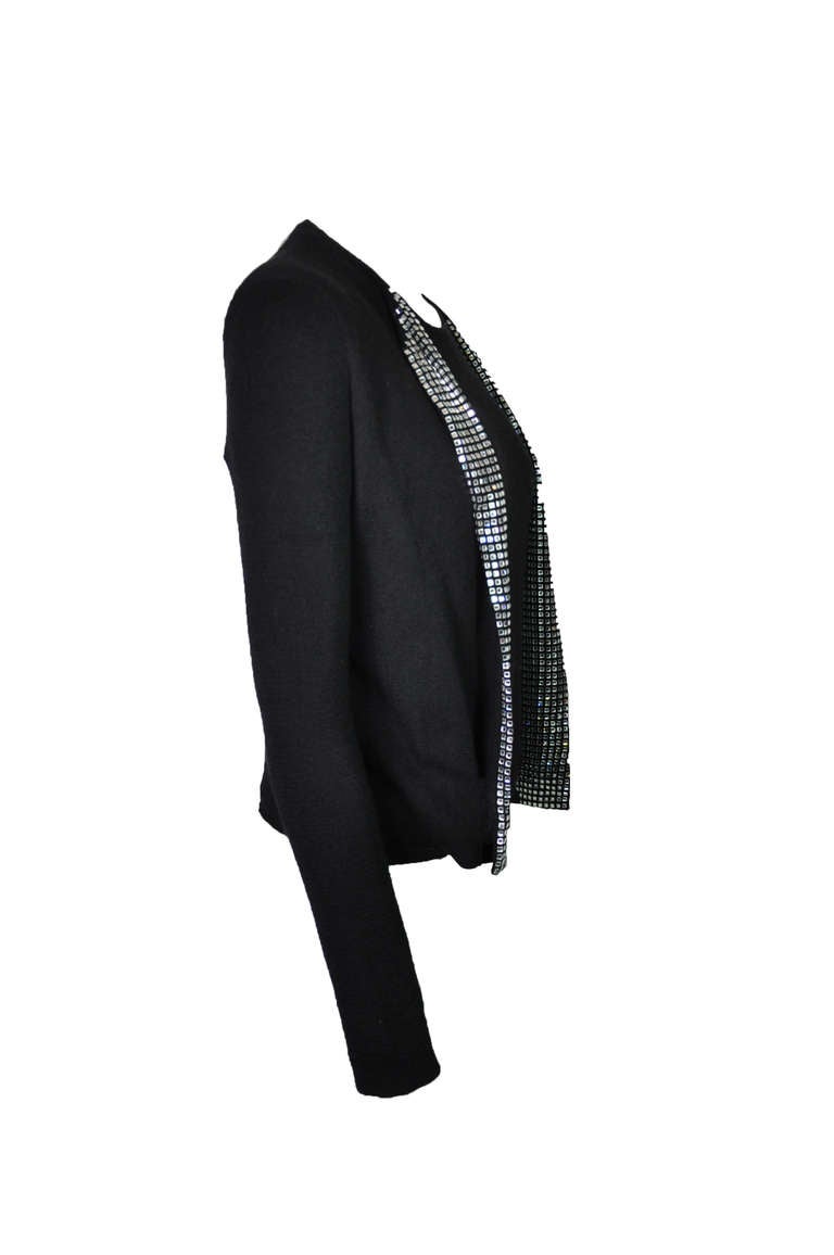 A very chic and sparkling rhinestone cashmere twin set from Gucci by Tom Ford in late 90'S. Only a few have been made.  The cardigan is fully lined in silk. The size is small.