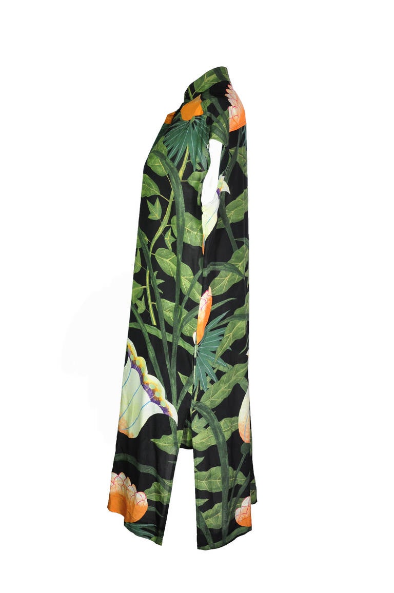 This over-sized cut Hermes silk dress is very comfy. The prints are inspired  by the plants of a South American summer.   Deep greens echo the luxuriant vegetation of a botanical retreat. Unexpectedly bold prints is set to dazzle every woman.