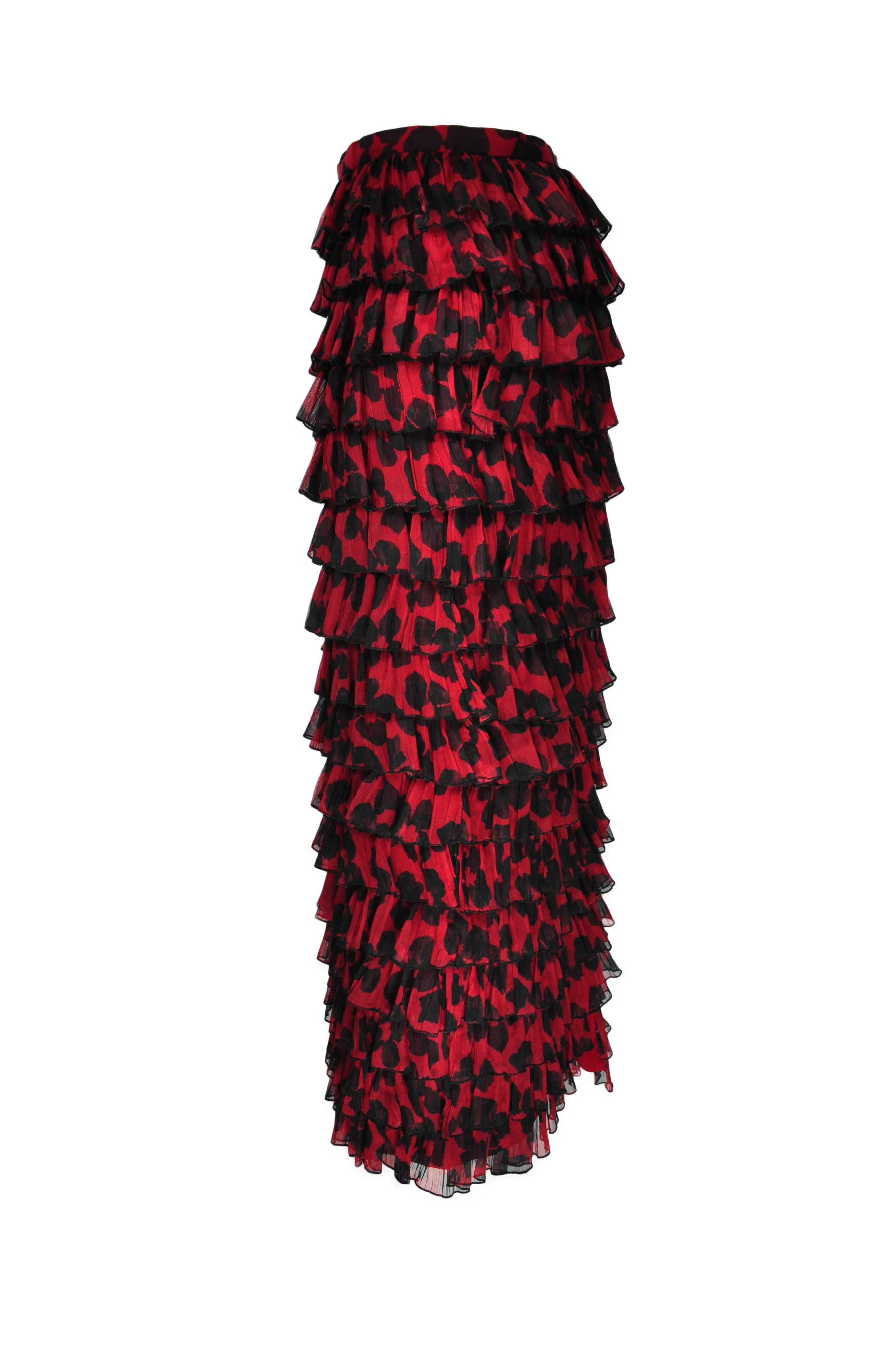 A printed maxi skirt with tiered ruffles. Zip fastening at back. Fully lined.