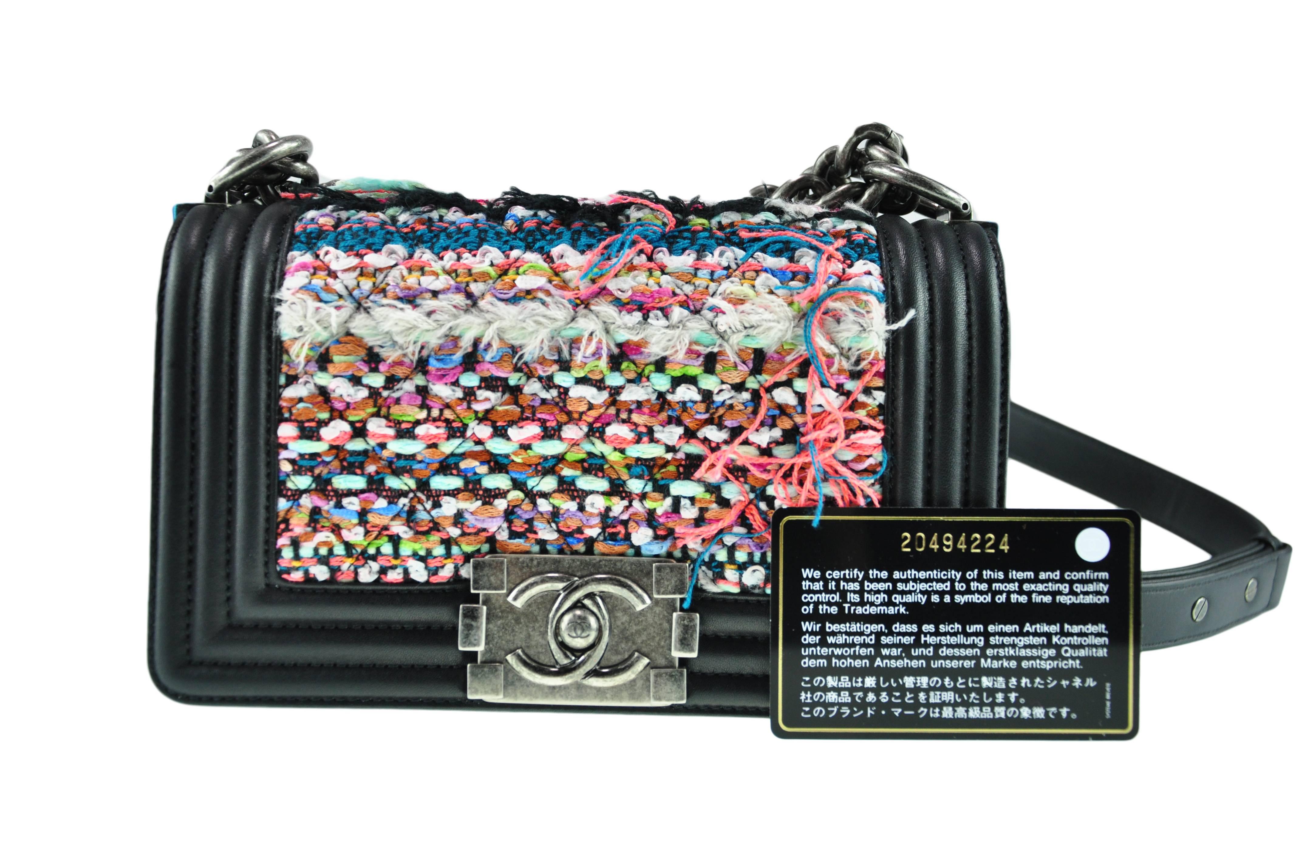 A special edition of Chanel Boy in small size with multi-color tweed.  Pewter chain shoulder strap with leather frame. One interior open pocket. It comes with authenticity card, dust bag and gift box.
Measurement: 8