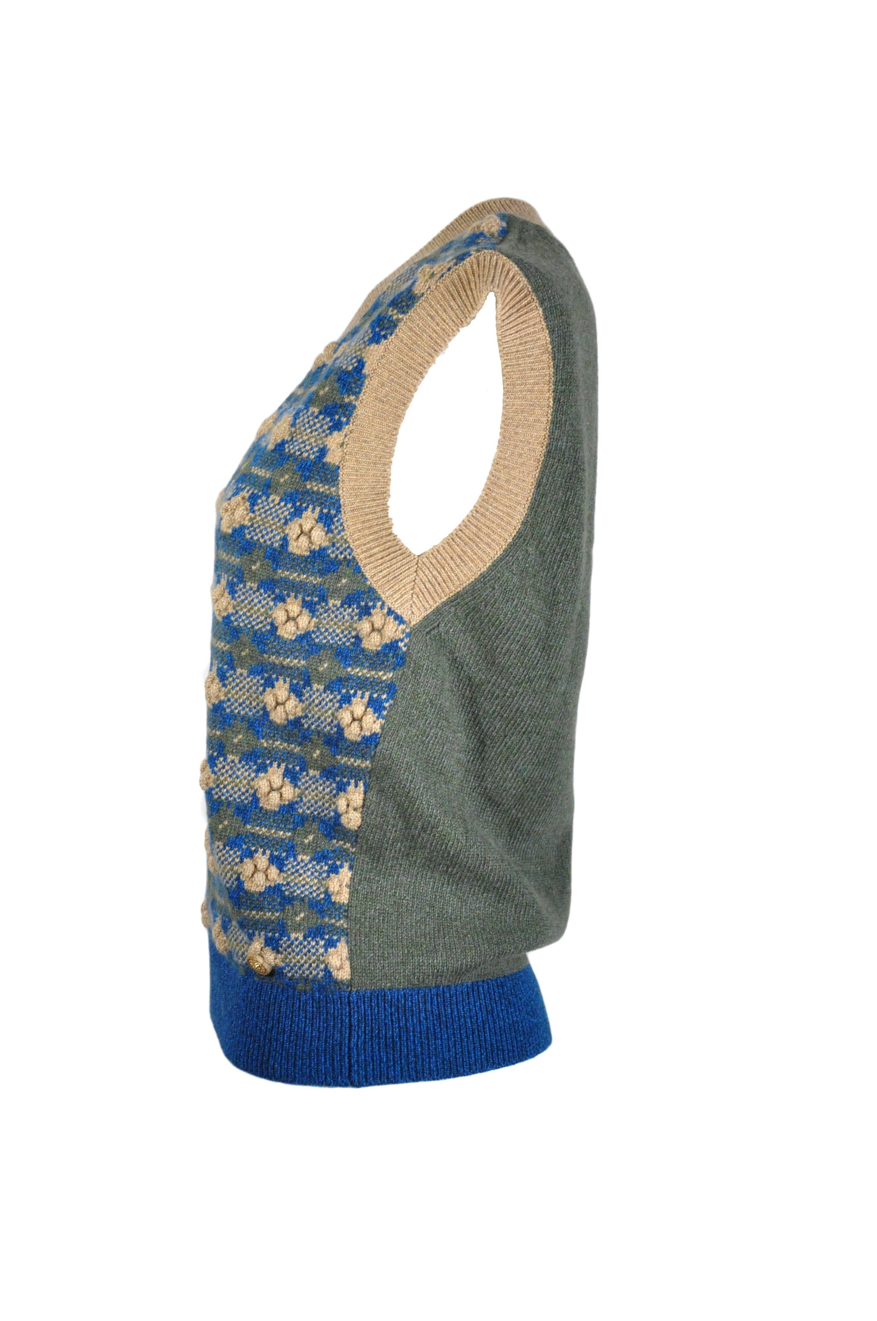 A deep V neck beautiful knitted cashmere sweater vest from Chanel Brasserie runway collection.  