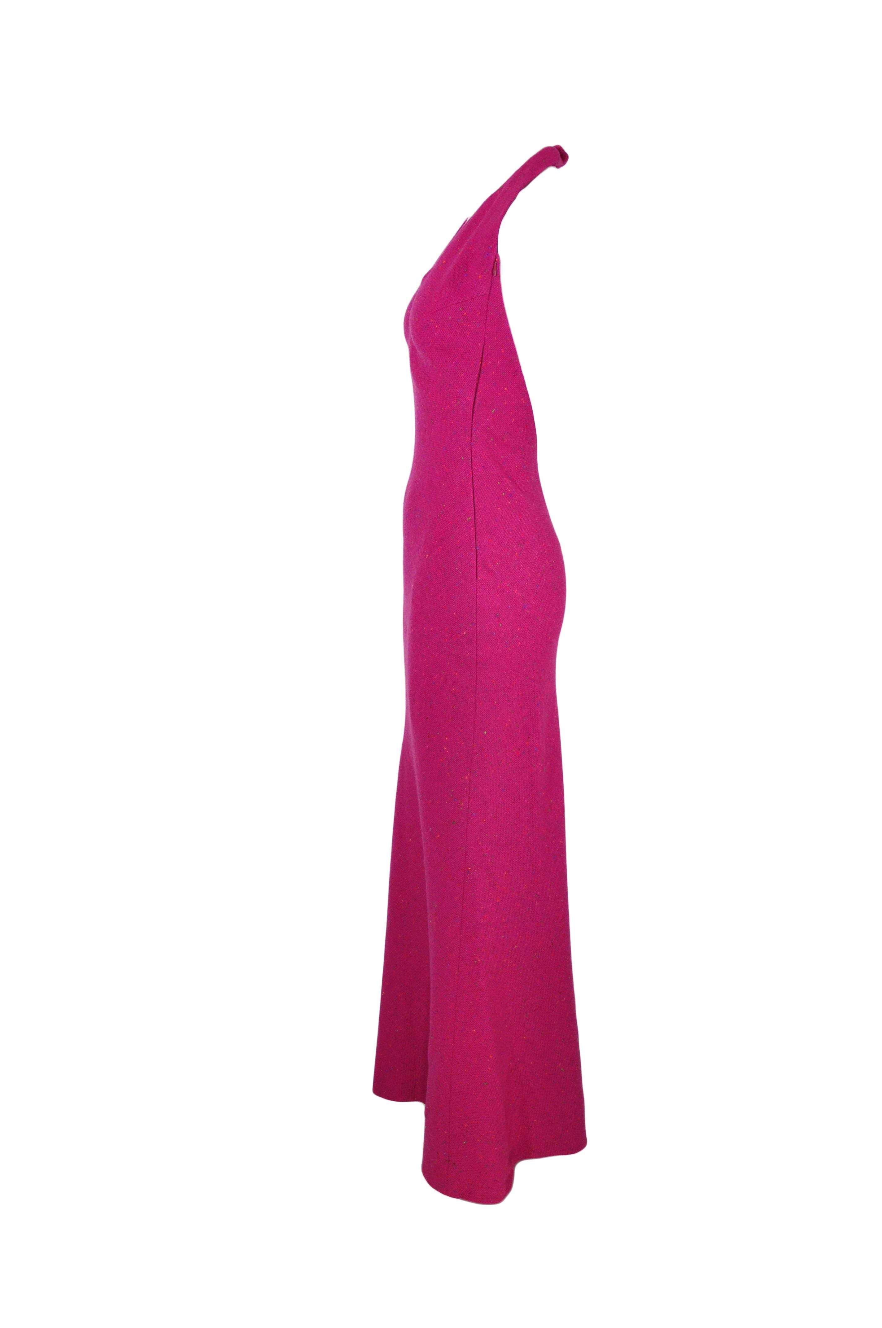 A figure-flattering designed dress with halter deep V-neckline, zip fastening at side.  Fully lined.