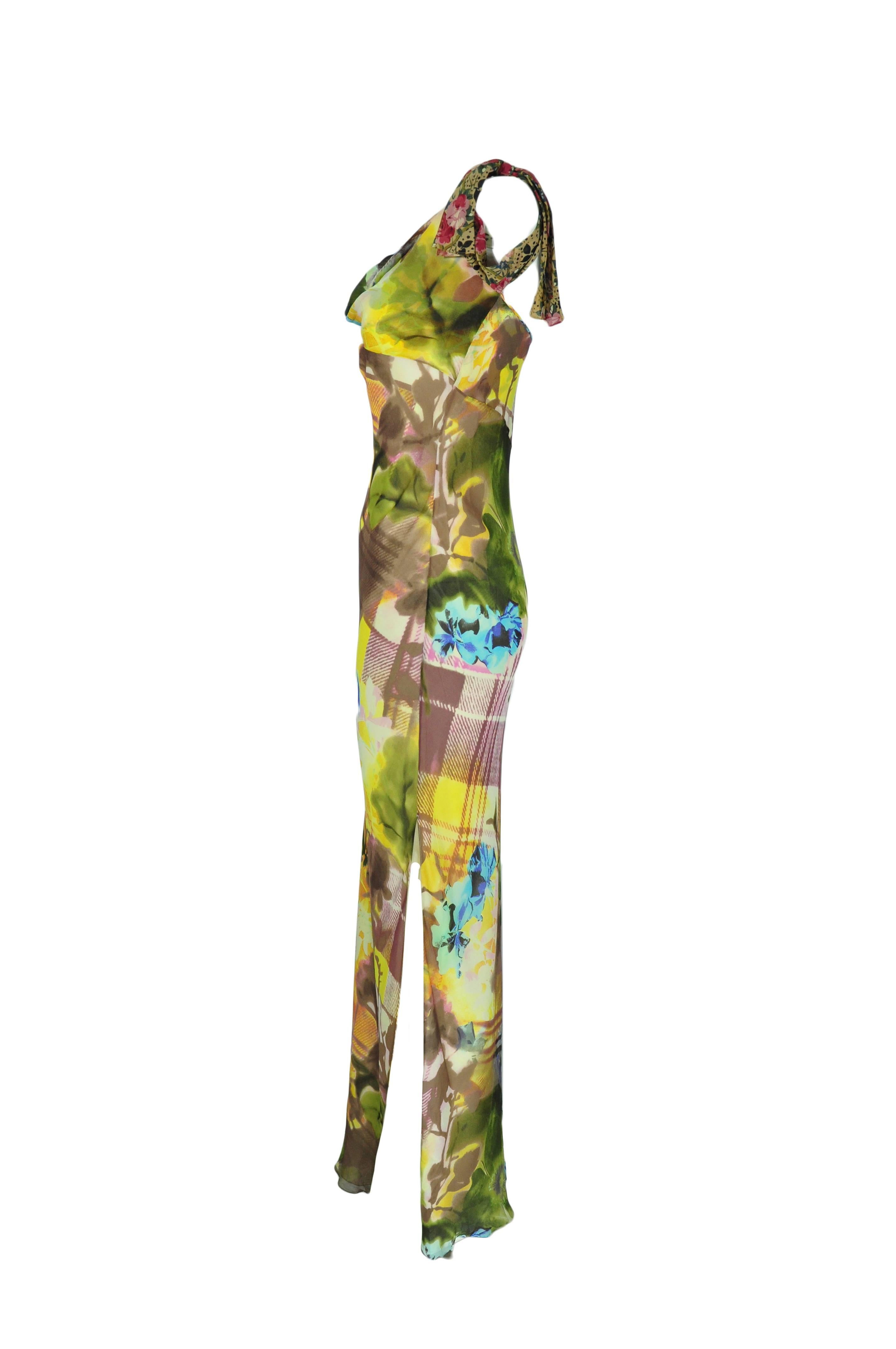 A pull on multi-color floral print silk maxi dress with high slit at side. Fully lined in silk.