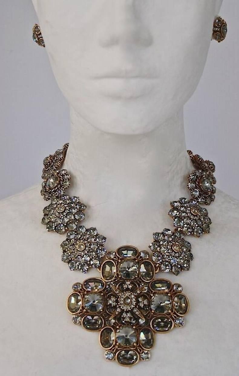 Pewter brass metal and faceted "black diamond" Swarovski crystal statement necklace from Oscar de la Renta.

16"W with 4" extension
Drop 3.5"L