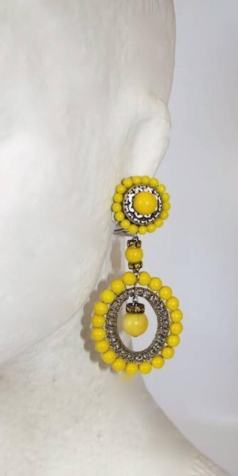 Yellow glass bead earrings with silver detailing from Francoise Montague. 

3
