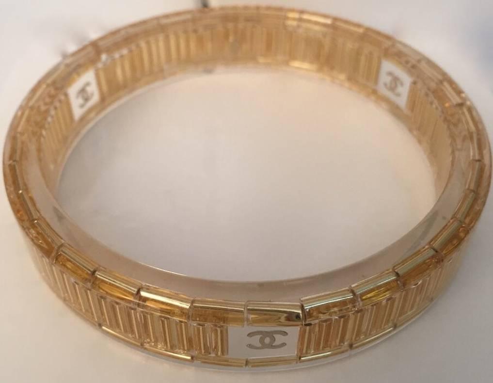 Chanel Gold Resin Logo Bangle Bracelet In Excellent Condition In Virginia Beach, VA