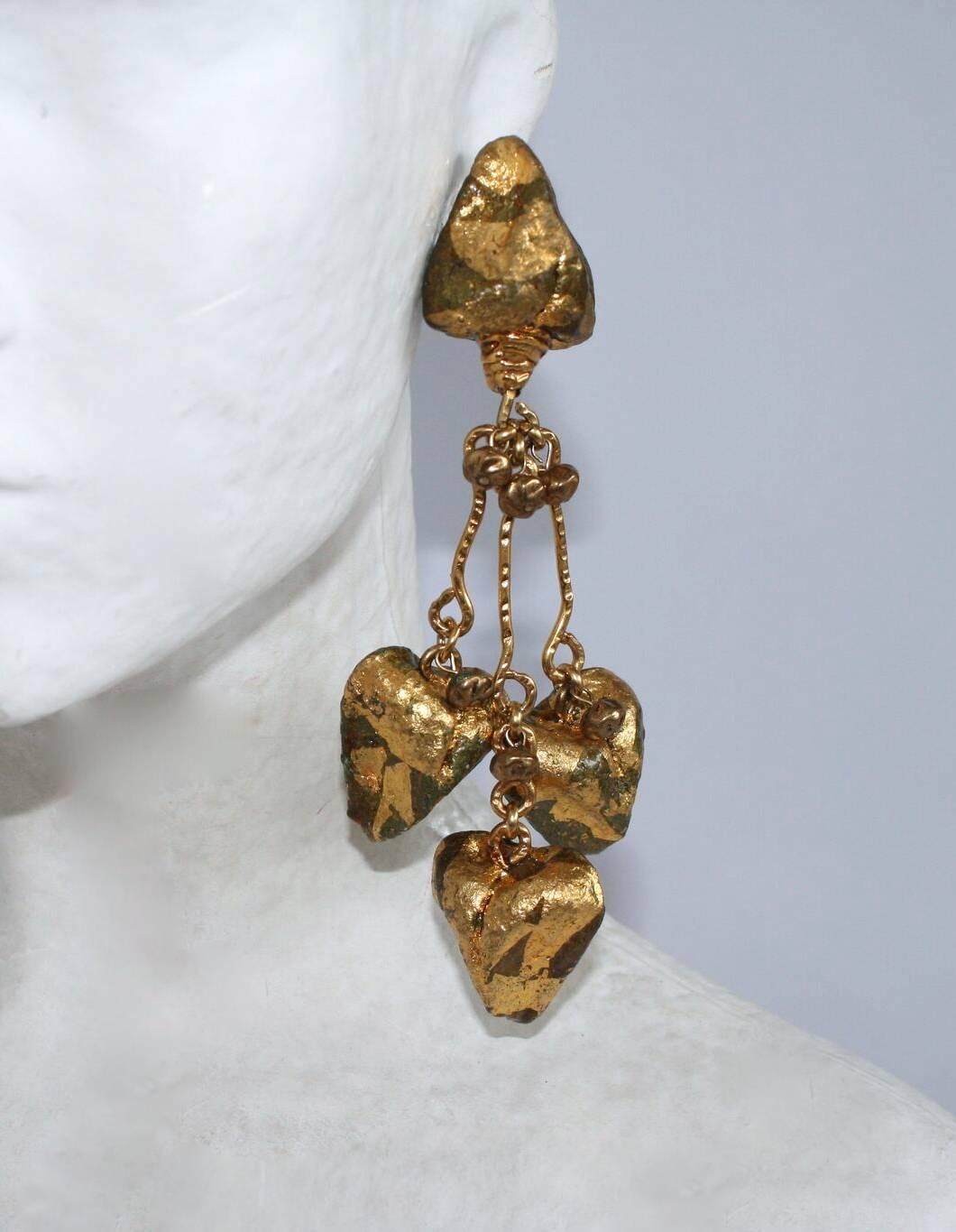 Papier-mache oversized fabulous vintage clip earrings with gold leaf detailing from Ignacio Toledo. 
