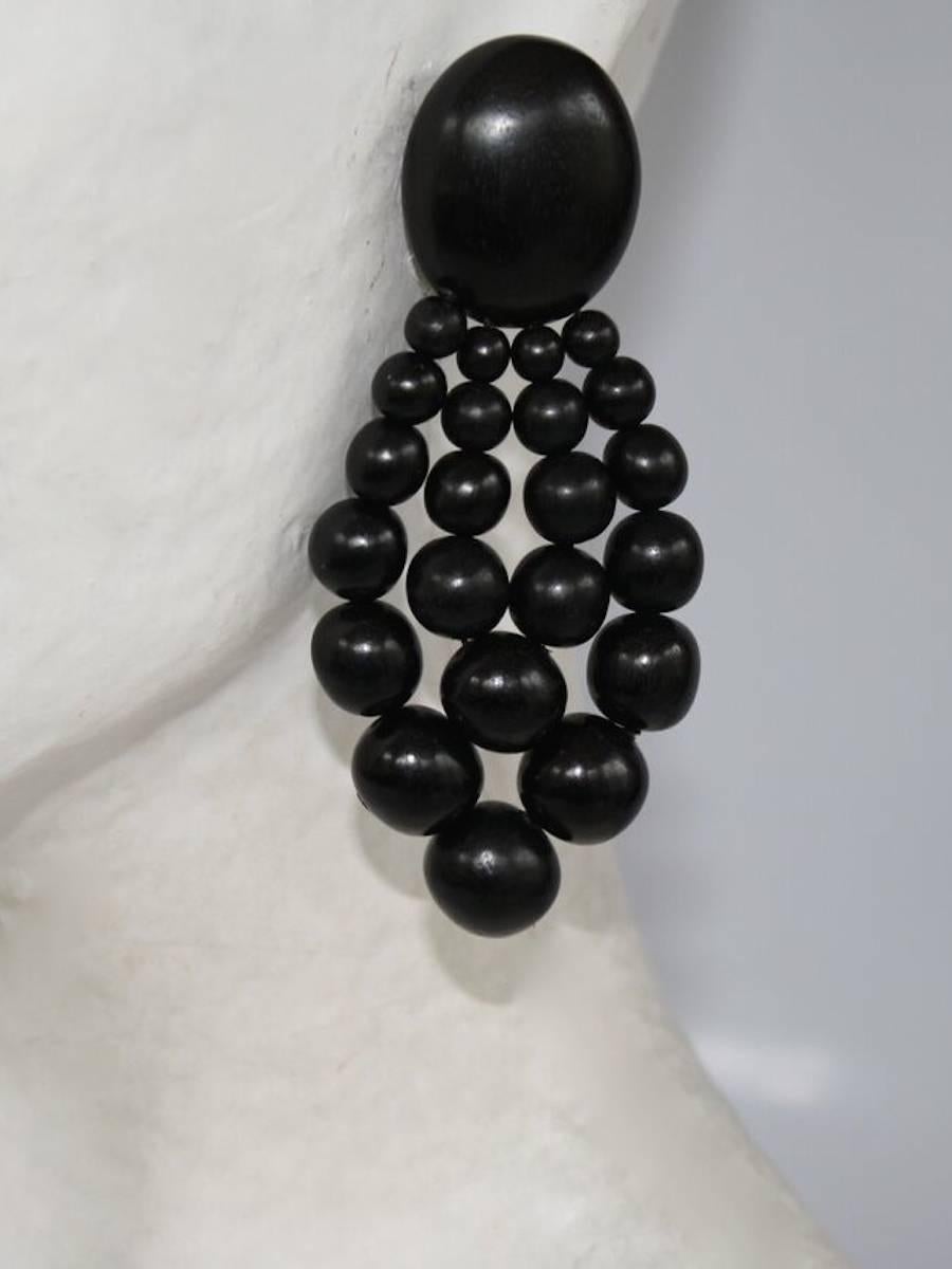 Ebony wood statement clip earrings from Monies. 

3.5