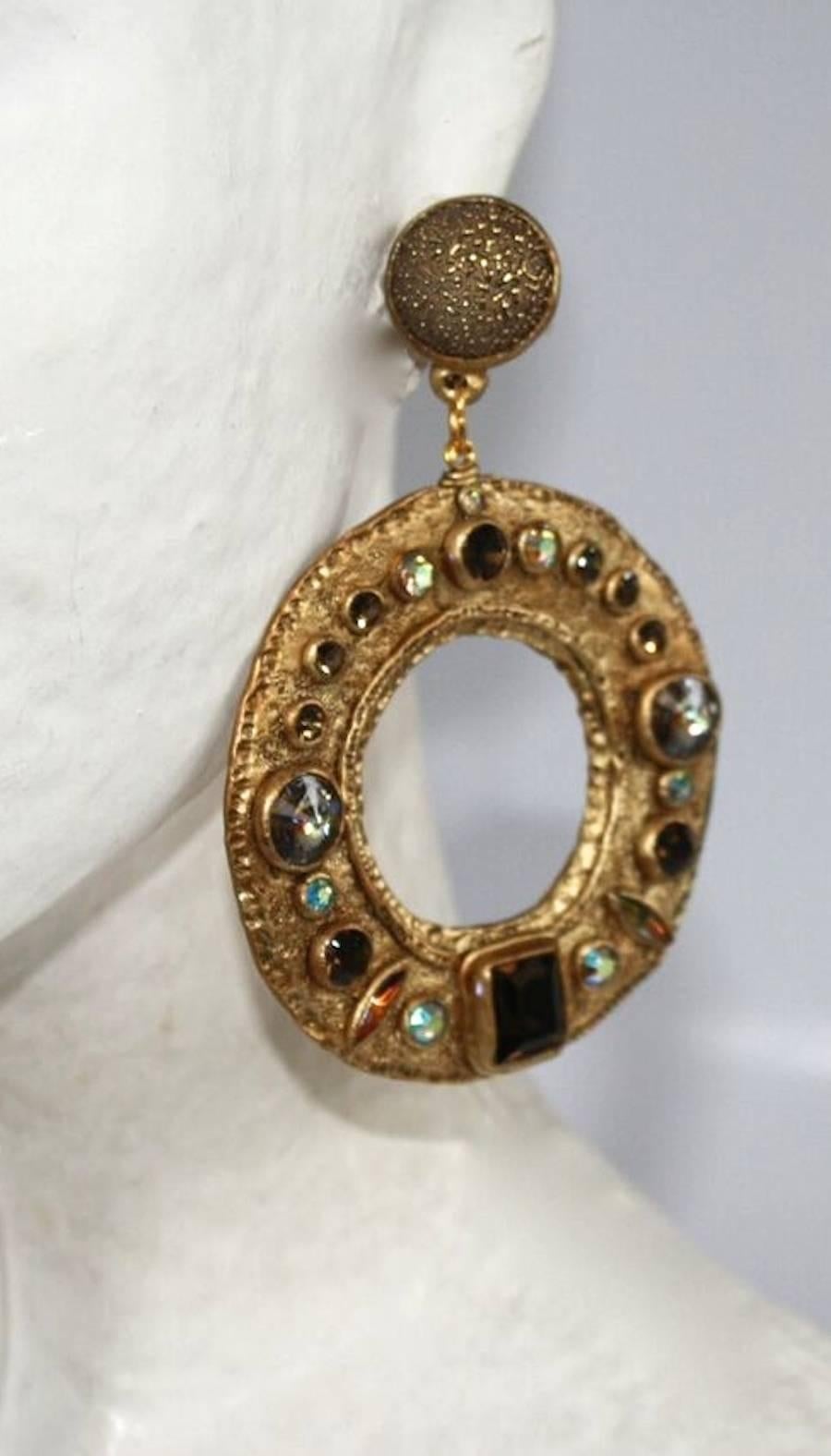 Fabulous handmade large drop circular clip earrings in papier mache with Swarovski crystal detailing. Very lightweight. 

4