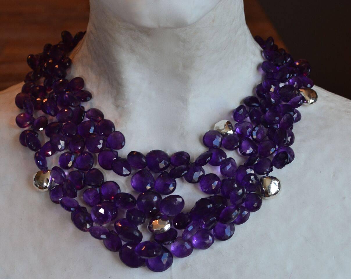 Patricia Von Musulin Amethyst and sterling silver petal necklace. Hand strung on Japanese silk with decorative solid sterling silver closure. 