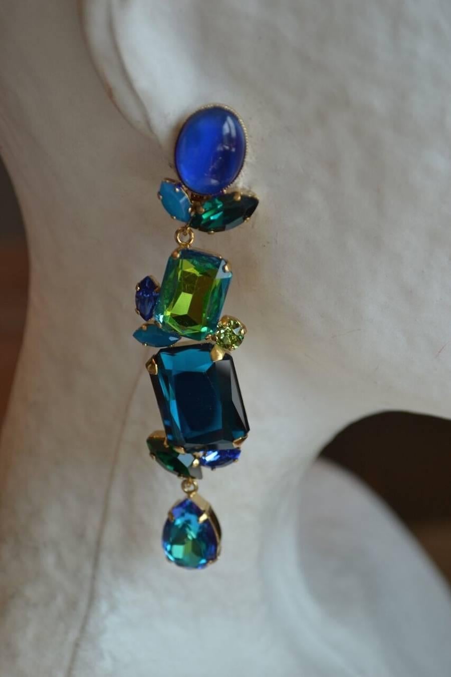 Swarovski crystal blue statement clips from French designer Philippe Ferrandis.