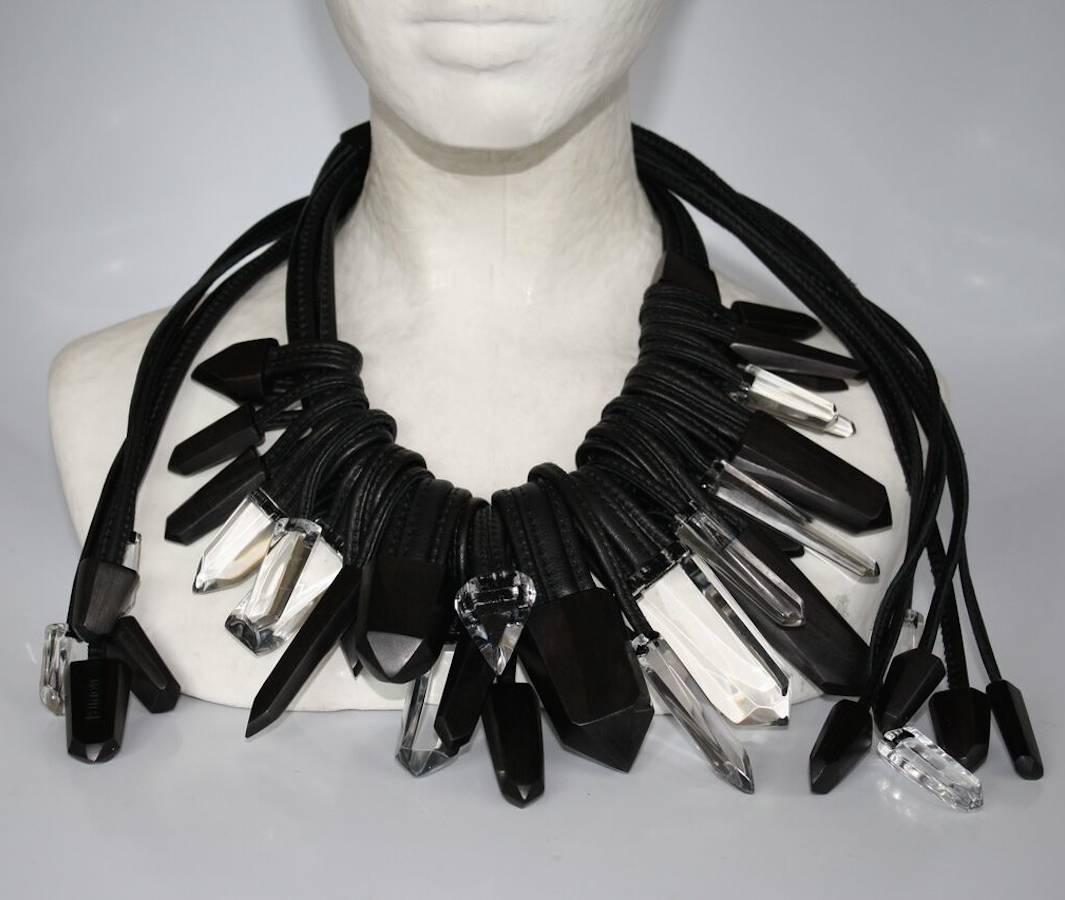 Monies Jewelry ebony, acrylic, and leather one of a kind necklace. Size is adjustable with leather pulls in the back. 