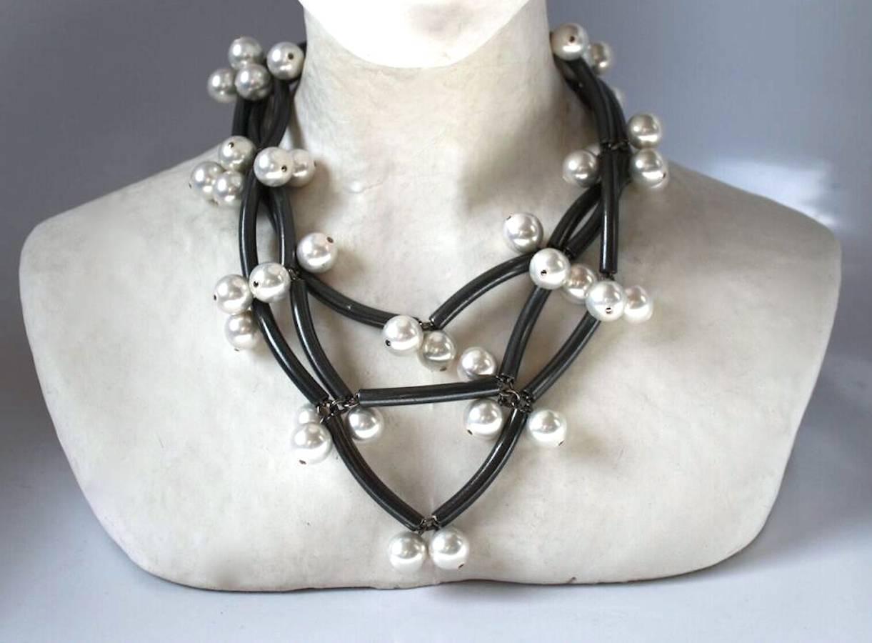 Rhodium tube and vintage glass pearl Elke necklace from Francoise Montague.   

17