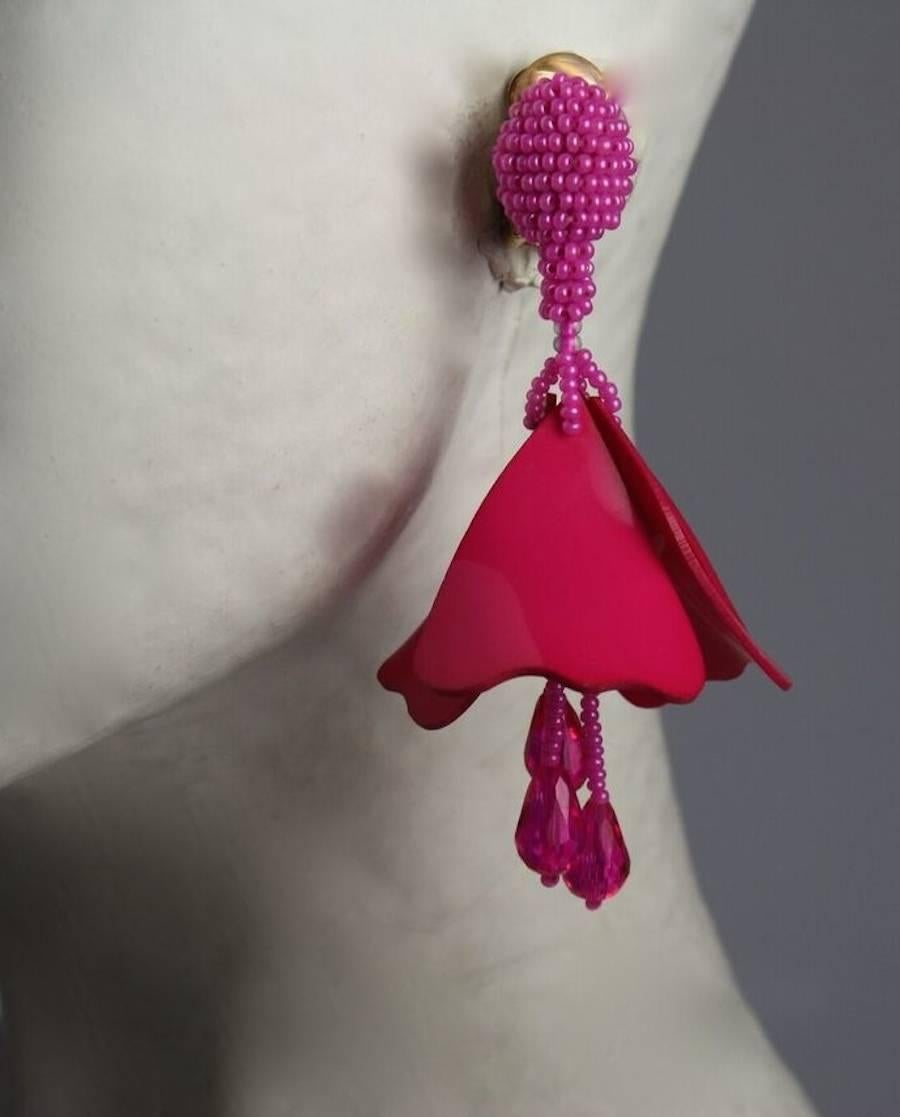 Oscar de la Renta Hot Pink Mini Impatiens Flower Clip-On Earrings

Made with glass, plastic sequins, nylon, viscose, & brass

3.5