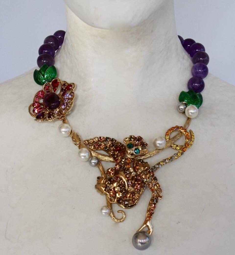 Amethyst, enamel, Swarovski Crystal and handmade pearl monkey necklace from Philippe Ferrandis. 

16