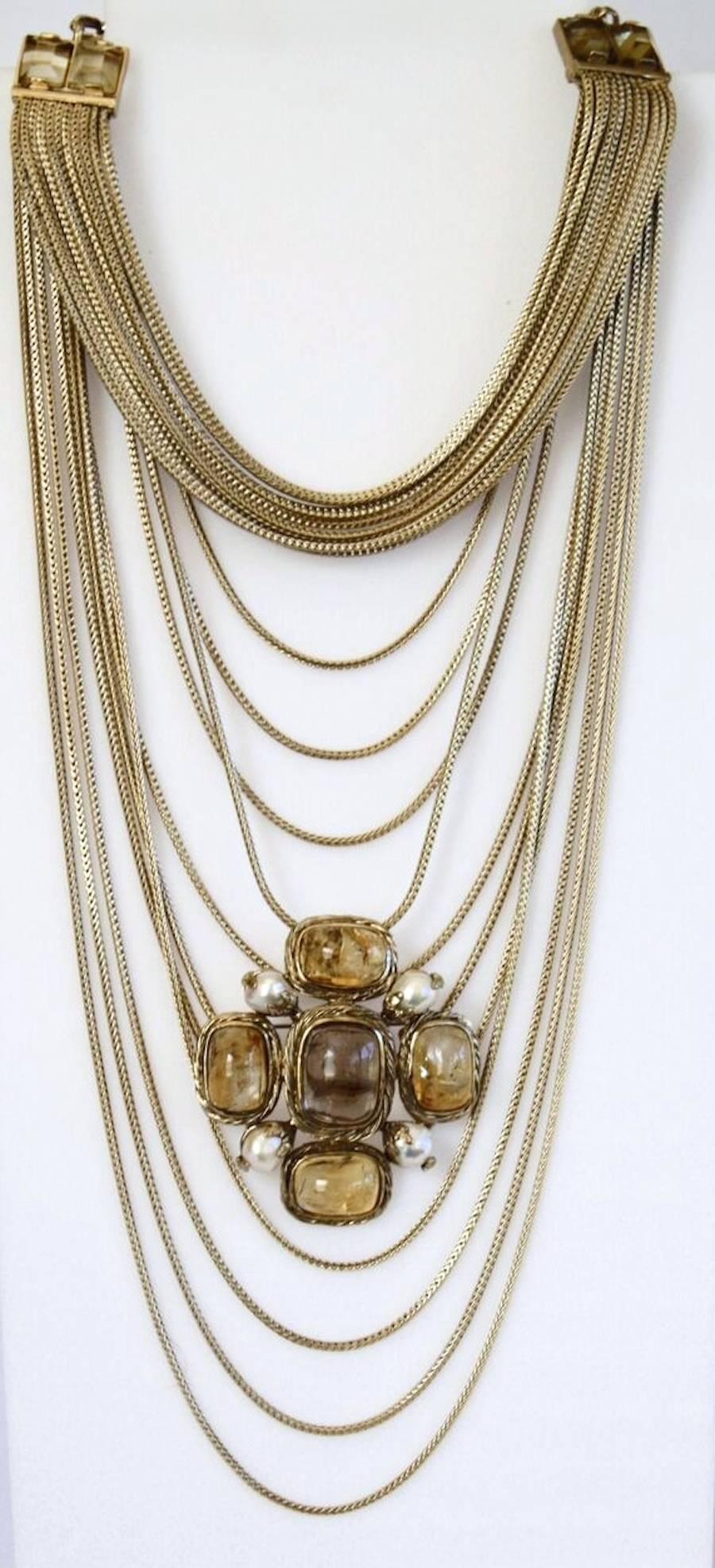 Goossens Paris pale gold multi chain necklace with rock crystal detailing. The chains are a gorgeous shade of gold and are made to hold decorative pins (sold separately). 

First layer of necklace is 13