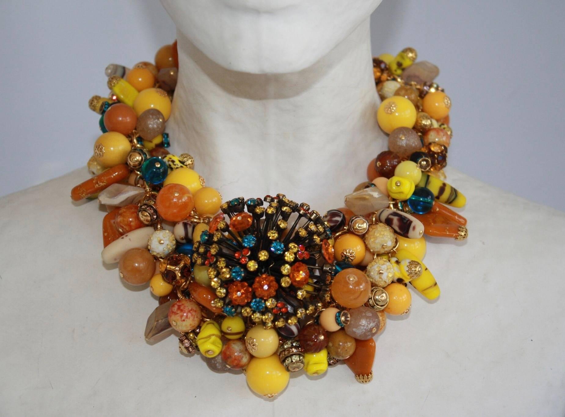 A one of a kind piece from French brand Francoise Montague. This gorgeous statement necklace is made with vintage glass beads and Swarovski Crystals. 

18