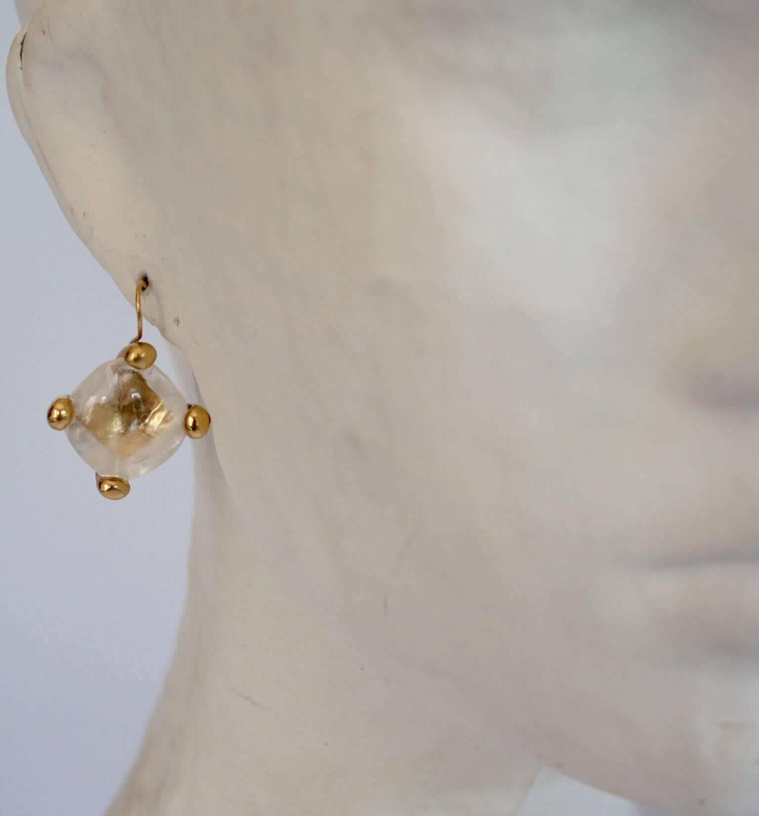 Smooth rock crystal drop earrings set in gold plated bronze from Goossens Paris. 

