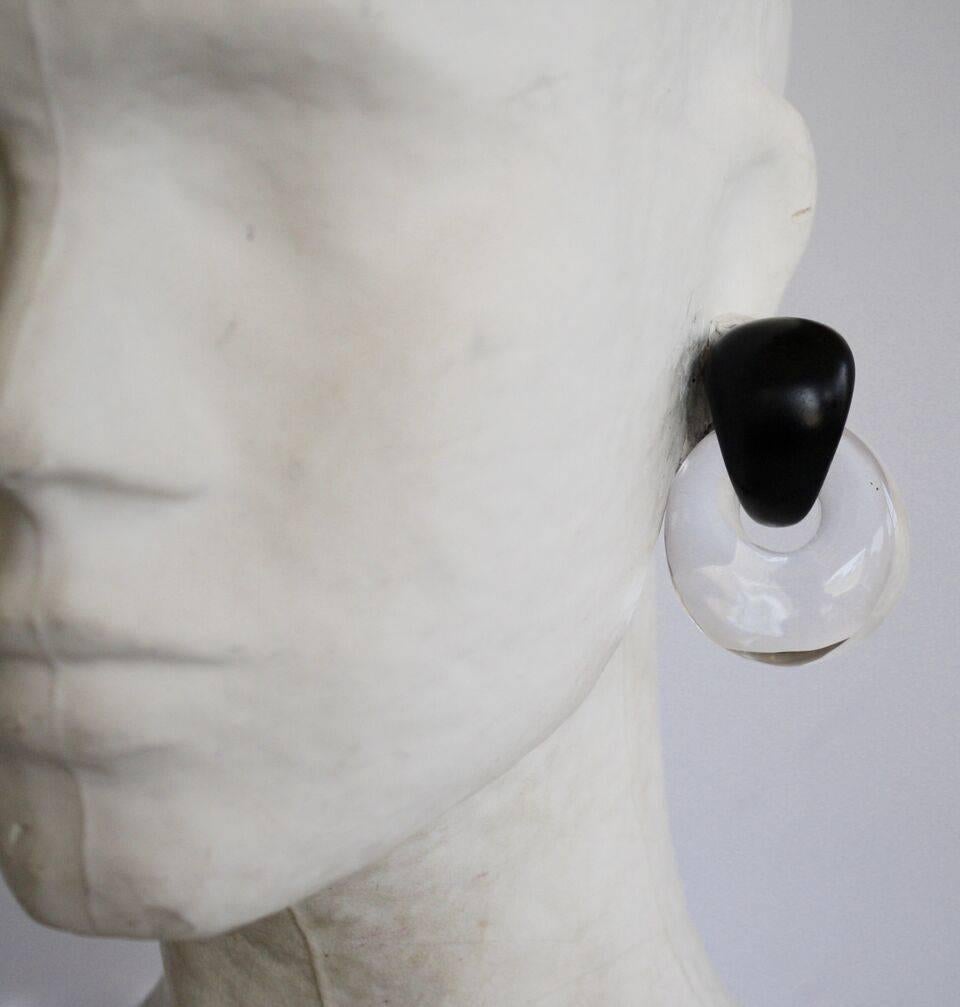 Lightweight statement making clip earrings in ebony wood and lucite from Monies. 