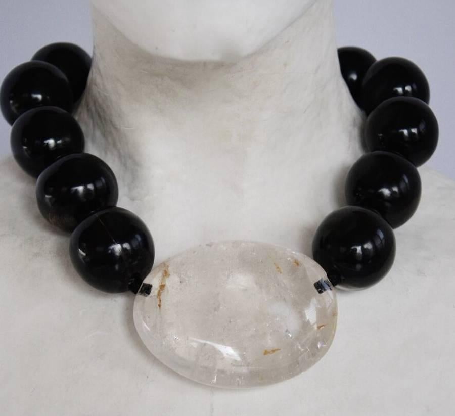 Ebony wood bead and rock crystal one of a kind necklace from Monies. Rock crystal is 2.5