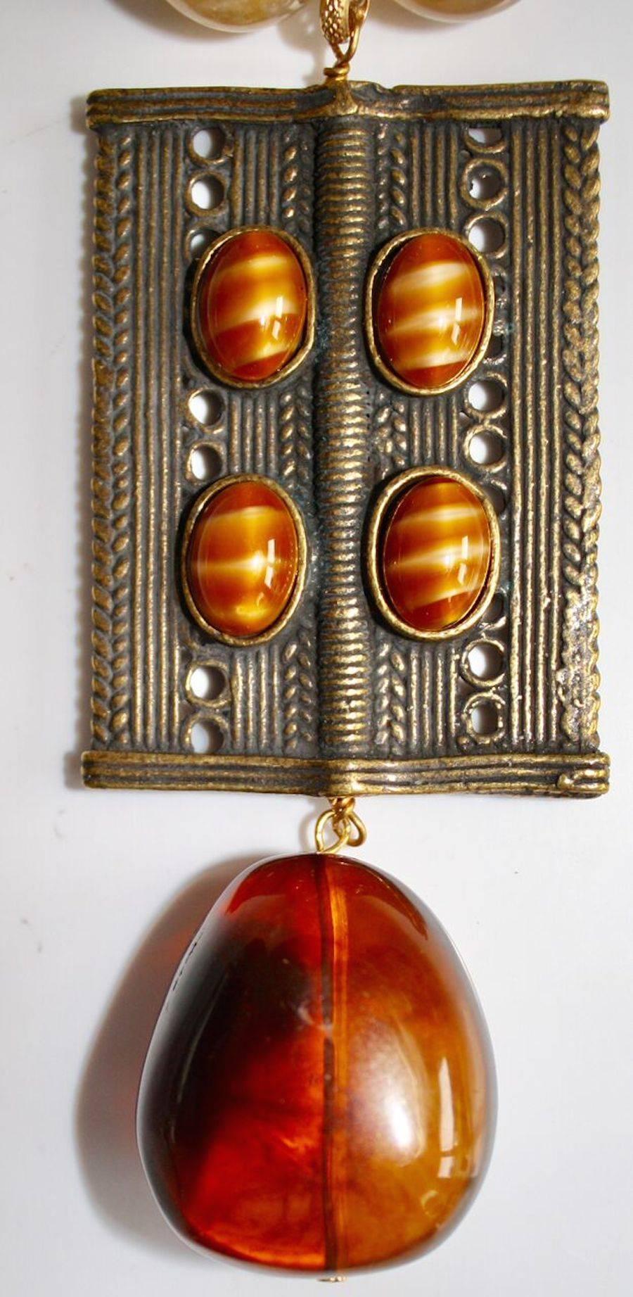 Limited Series Philippe Ferrandis glass cabochon, wood, citrine, resin, and carnelian pendant necklace. 

16