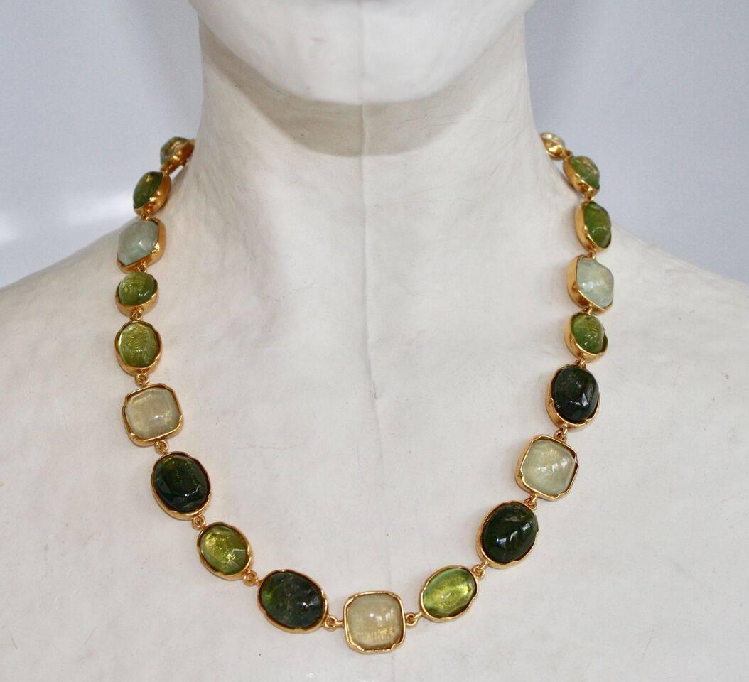 This rock crystal necklace is hand tinted to give it its gorgeous shades of green. Made by Goossens Paris.

16.5" long with 2" extra chain
