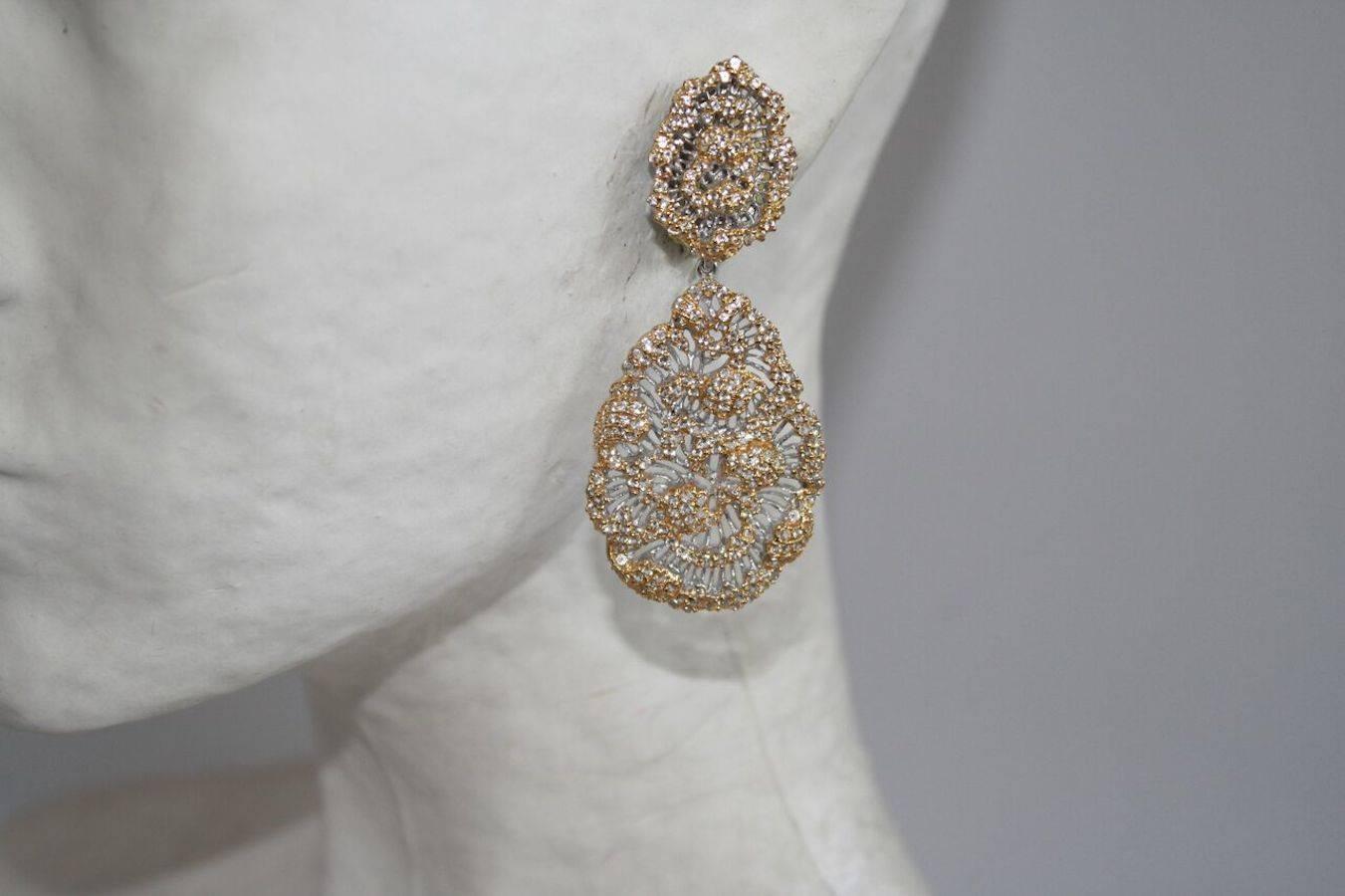 Gold and silver plated earrings with CZ in cutout filigree style. Clip earrings - striking and beautiful. 
